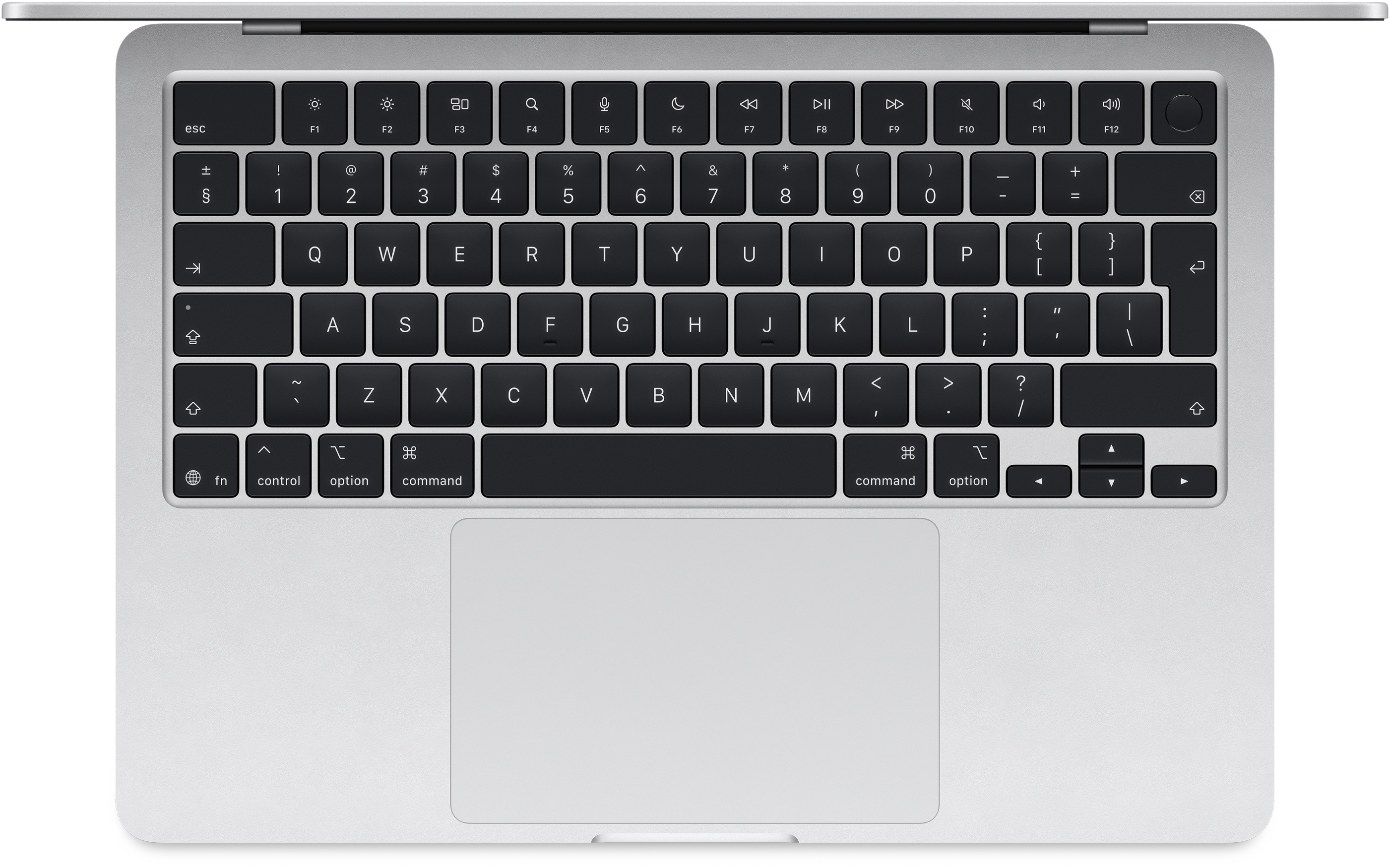Felülnézet egy ezüst laptop billentyűzetéről, látható billentyűzettel és érintőpaddal.