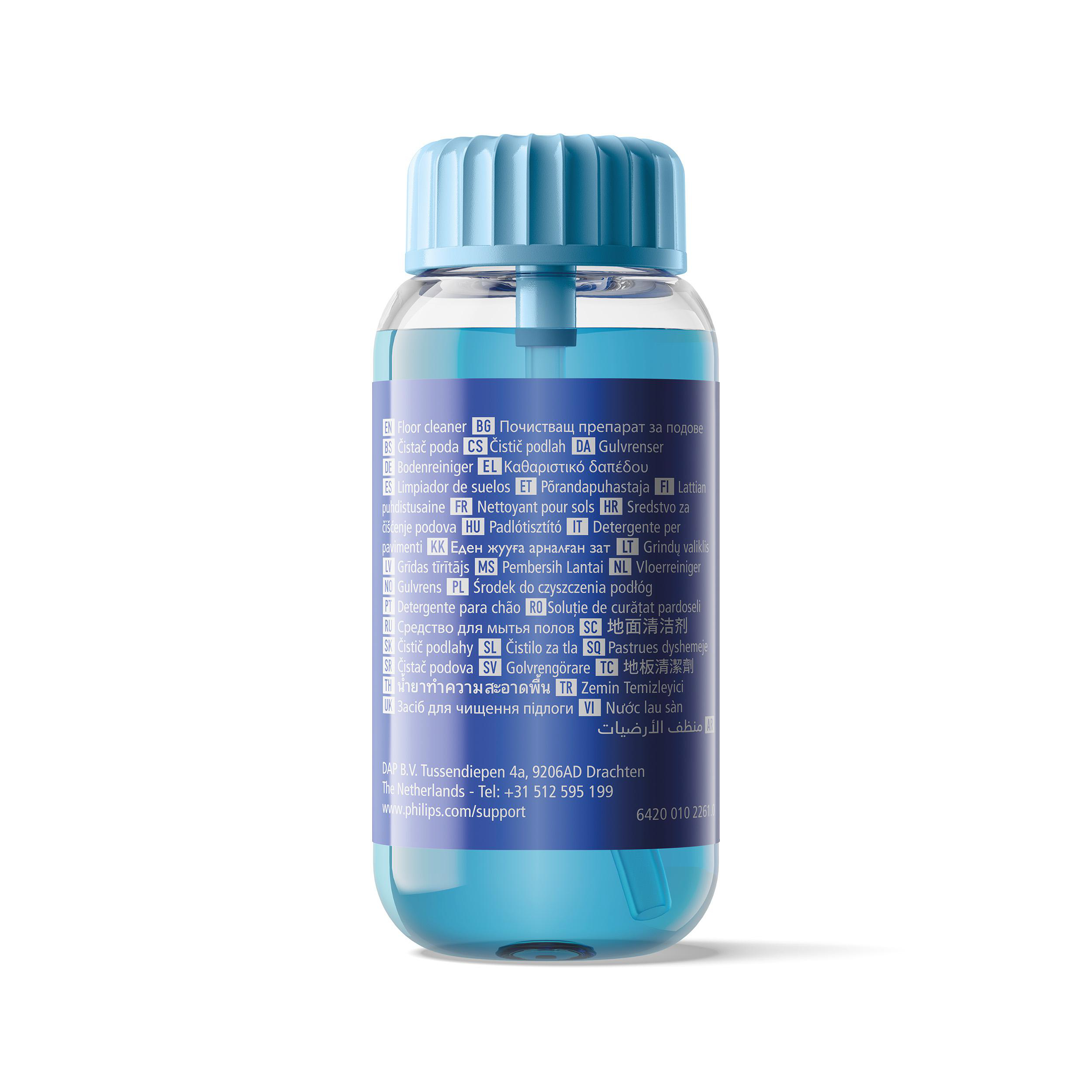 Eine blaue Flasche mit weißem Etikett, der Text ist in verschiedenen Sprachen. Der Deckel ist blau.
