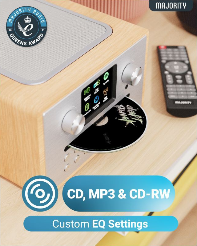 Une radio en bois avec un CD inséré. Le texte dit : CD, MP3 et CD-RW.