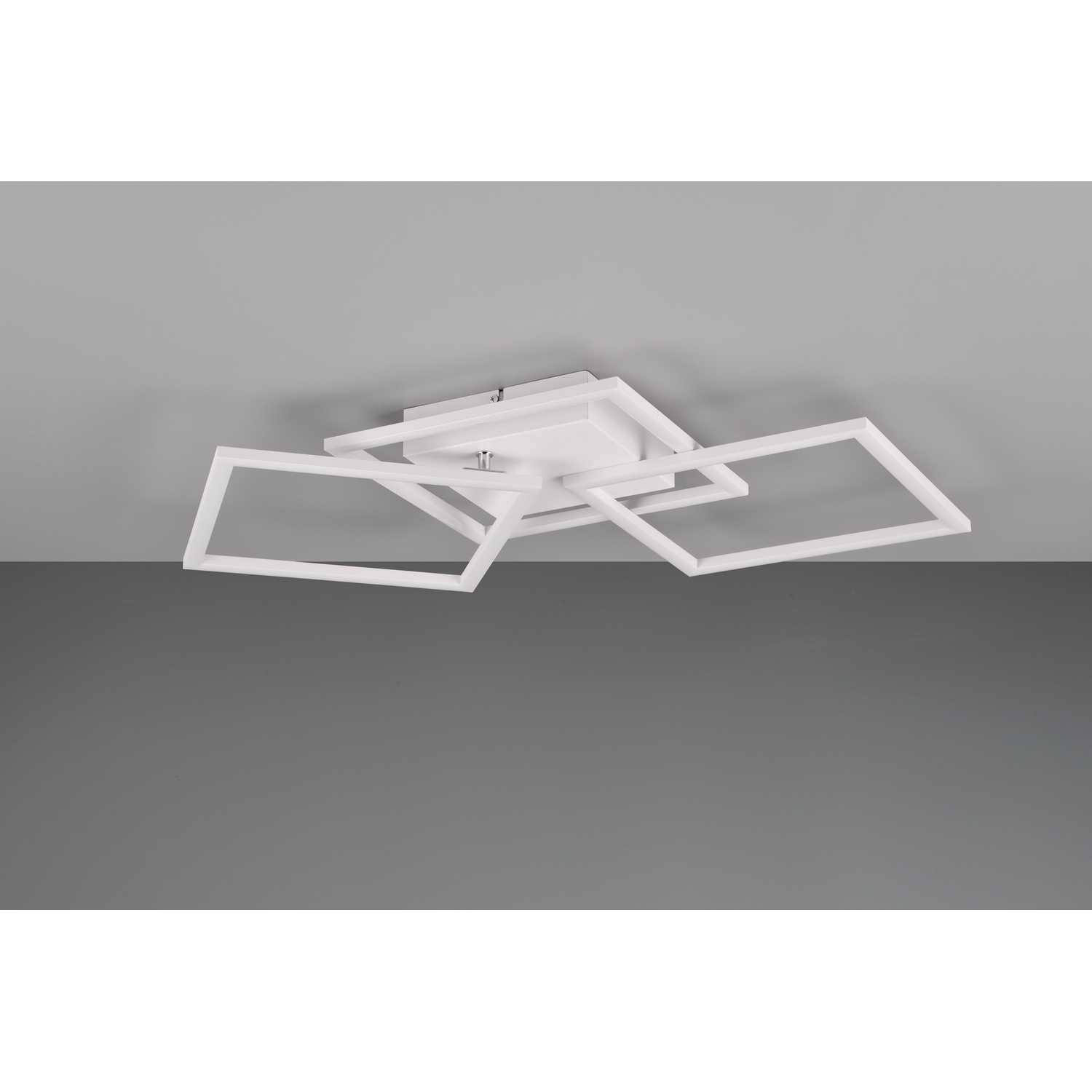 Lampada da soffitto moderna con design geometrico bianco su sfondo grigio.