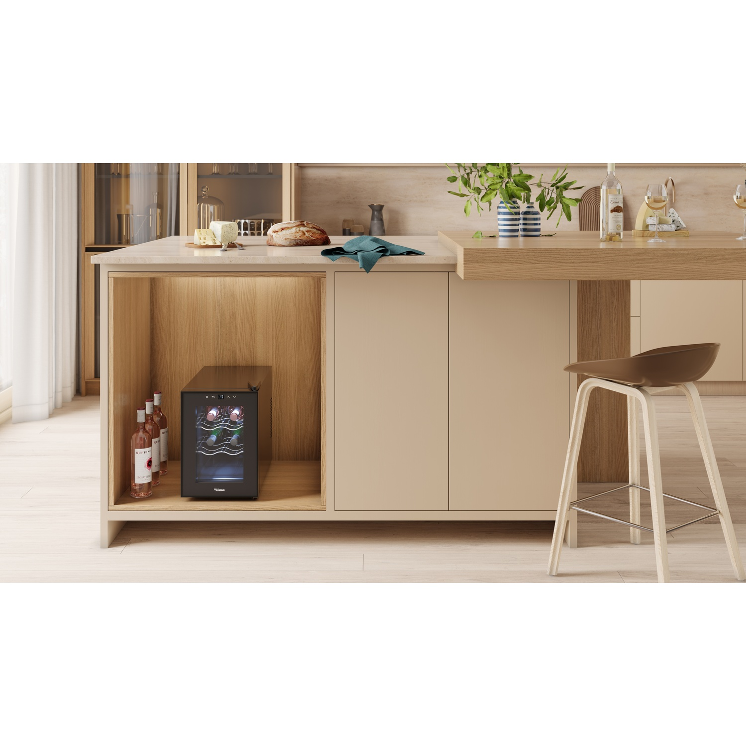 Kitchen island with wine cooler, bottles, a bar stool, and a wooden countertop. The background has more cabinets.
