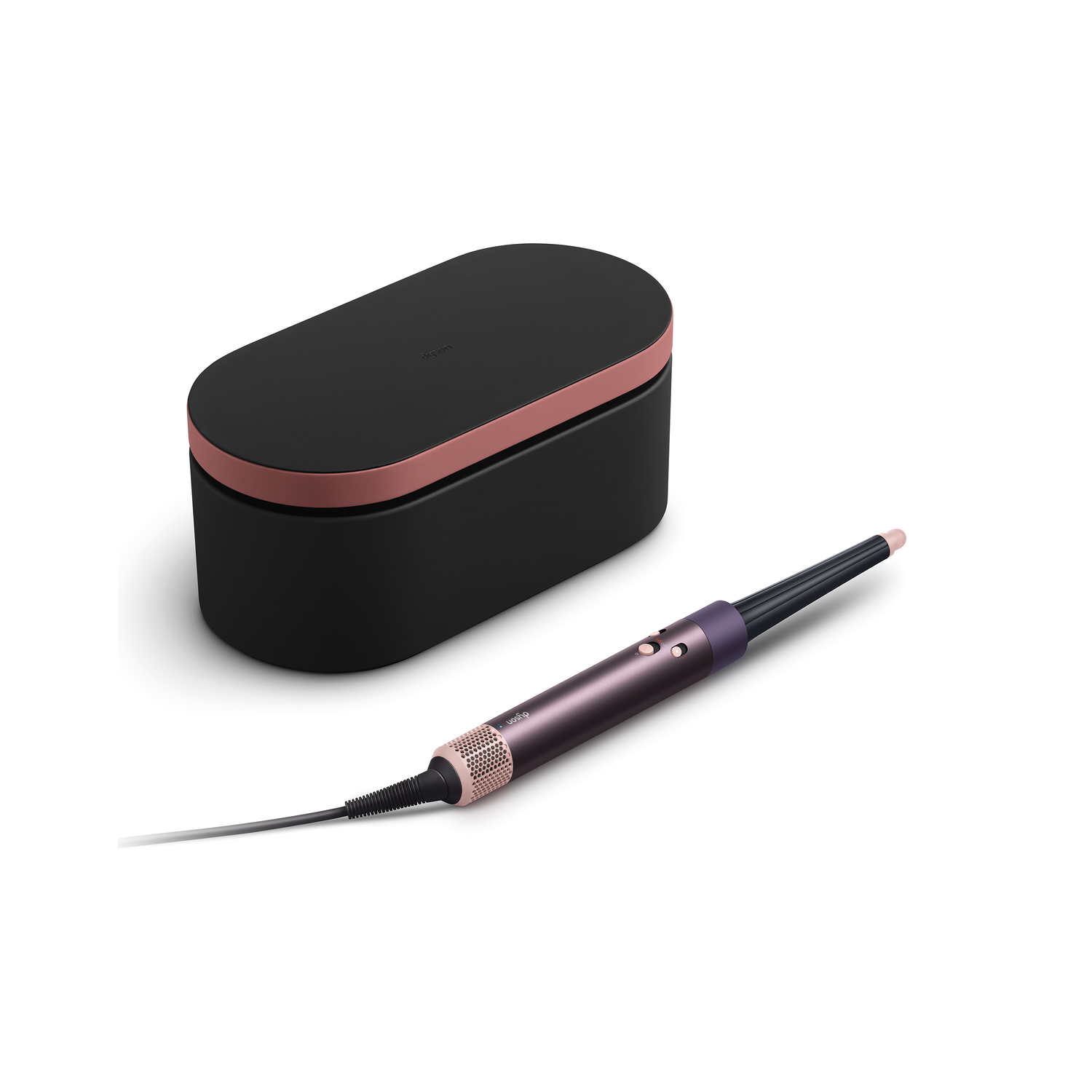 Un styler capillaire Dyson noir et or rose avec un étui noir sur fond blanc.