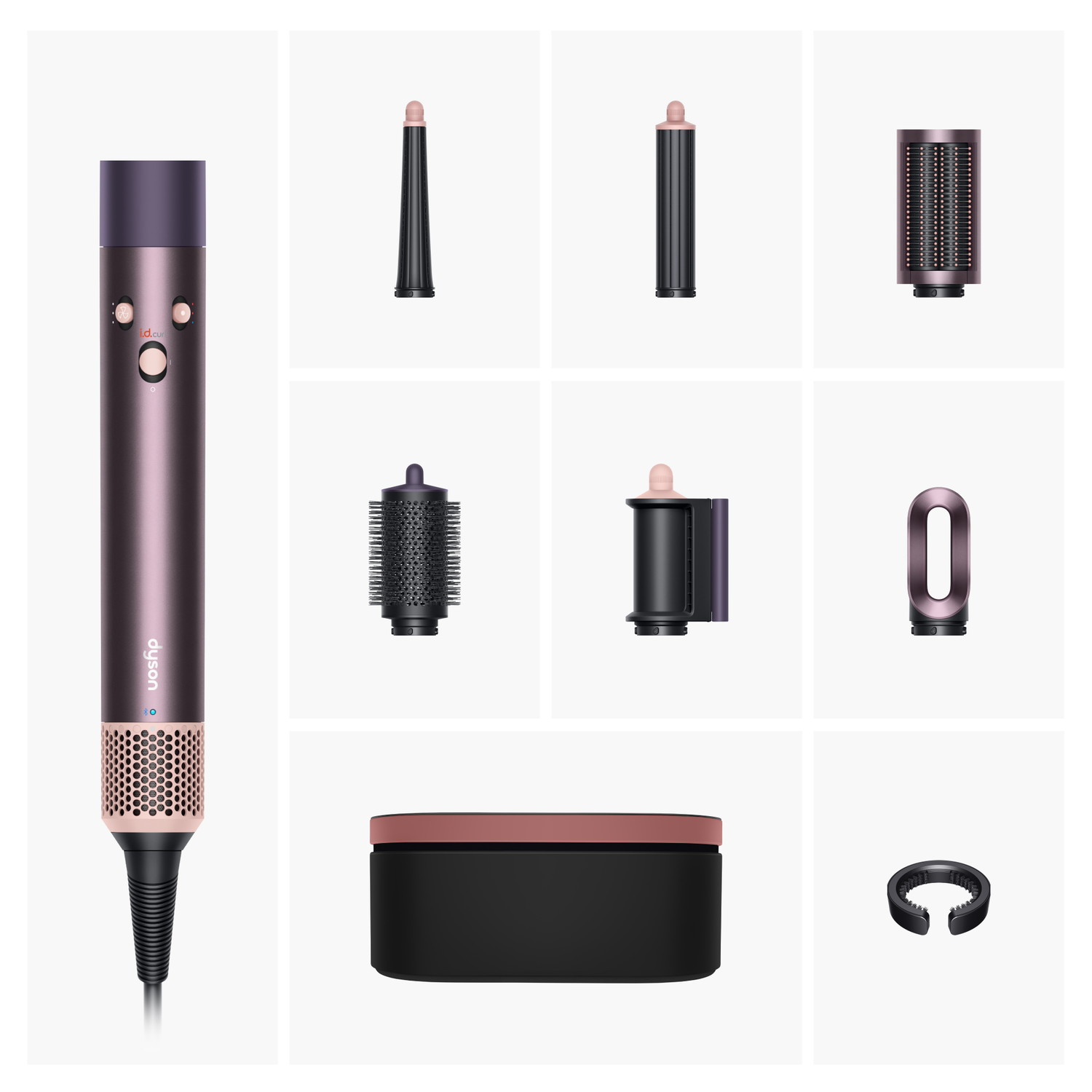 Outil de coiffure Dyson avec accessoires et étui de transport.