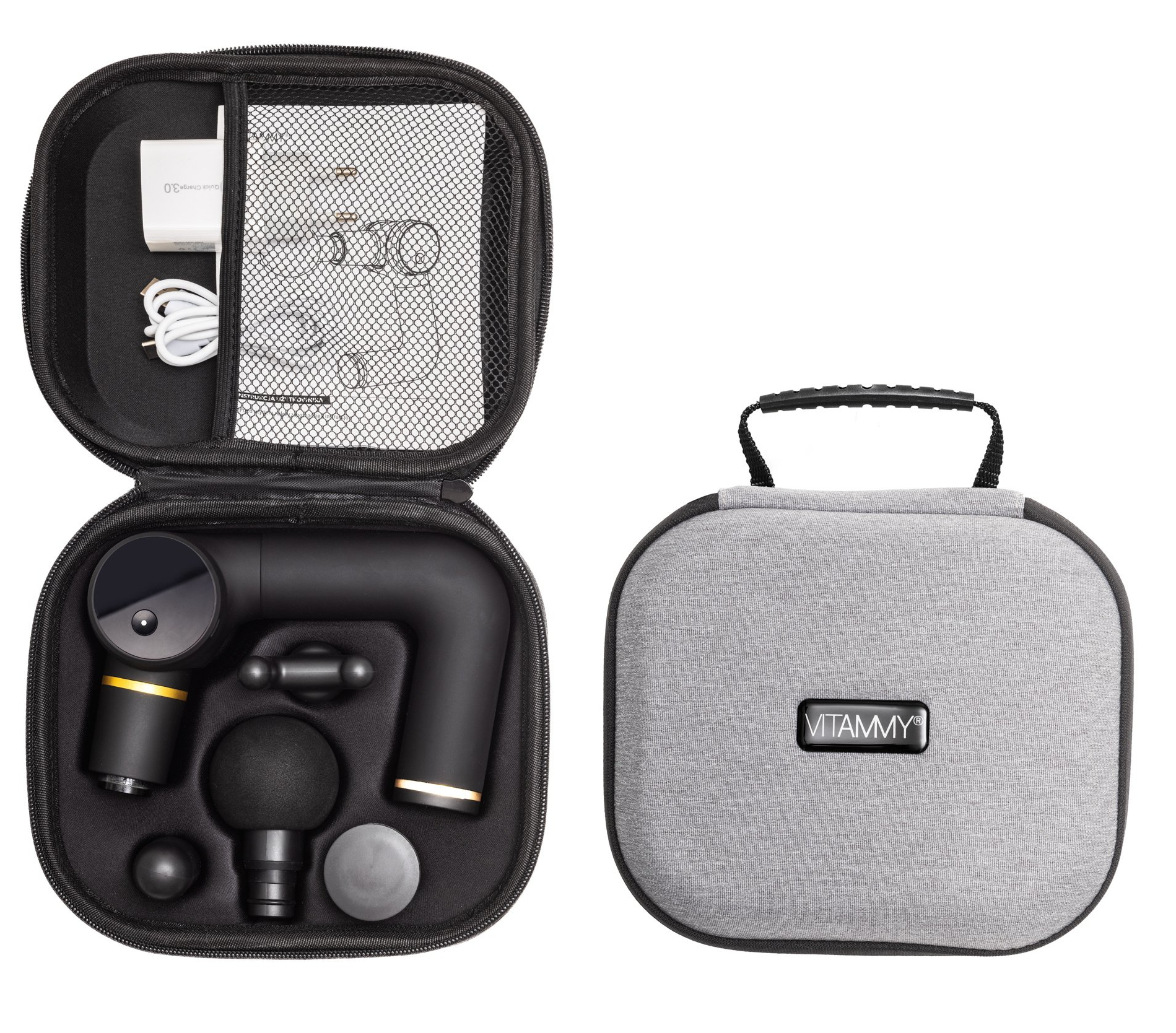 Otwarta czarna walizka z pistoletem do masażu, ładowarką i akcesoriami, obok zamkniętej szarej walizki.
