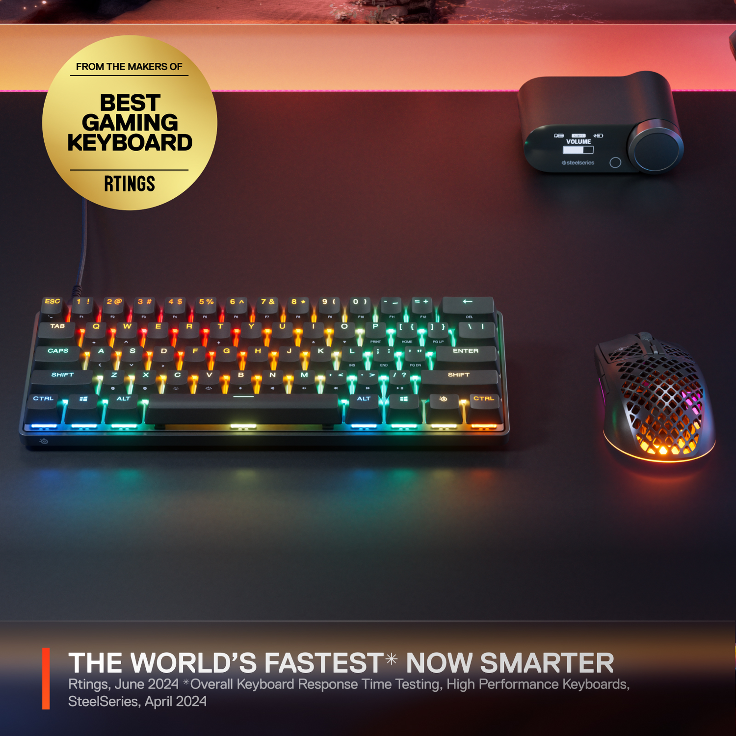 Gaming setup with keyboard, mouse, and a volume control device. The keyboard is lit with multiple colors.