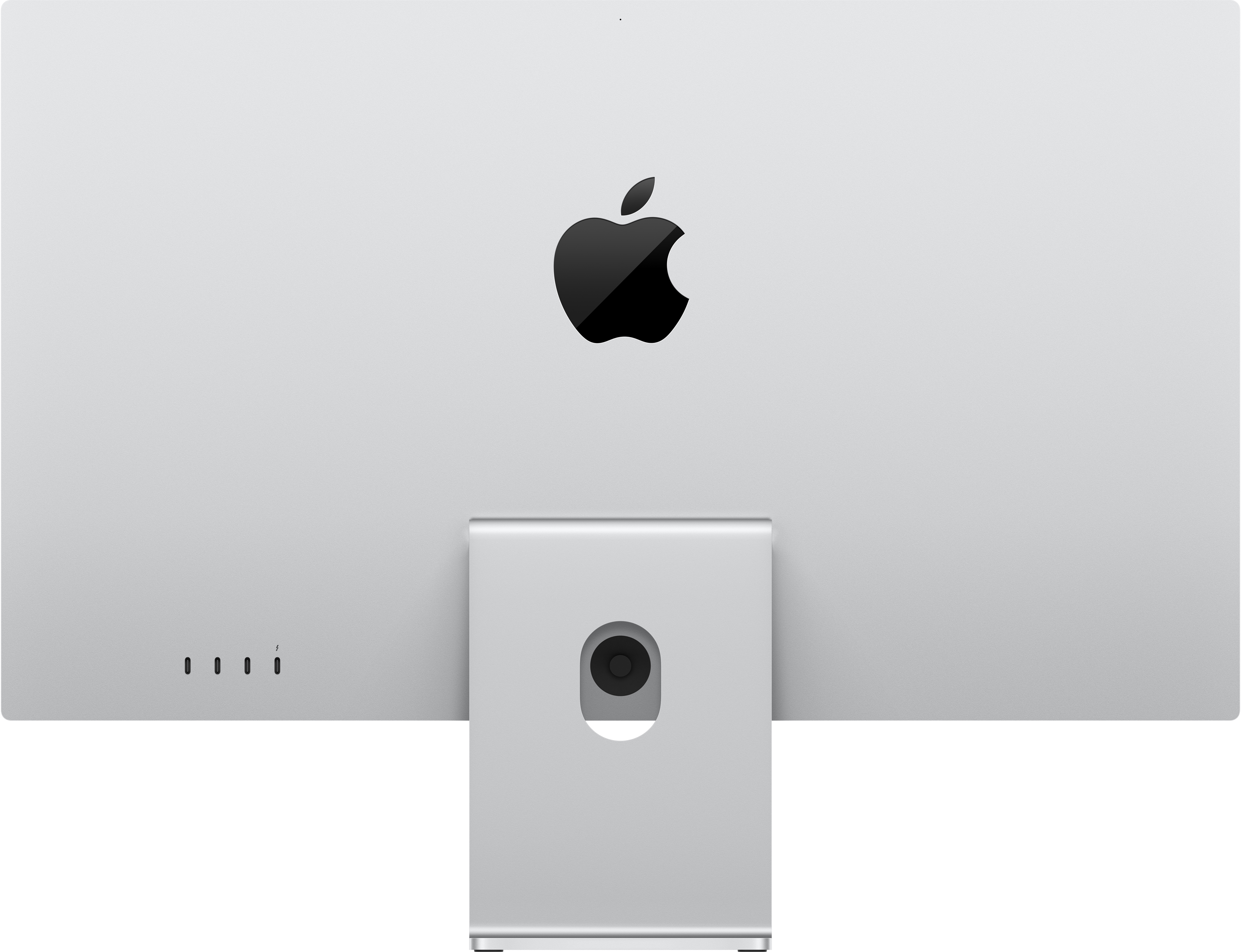 Ezüst Apple monitor hátulja. Fekete Apple logó. A kijelző állványa ezüst. Portok láthatók a hátoldalon.