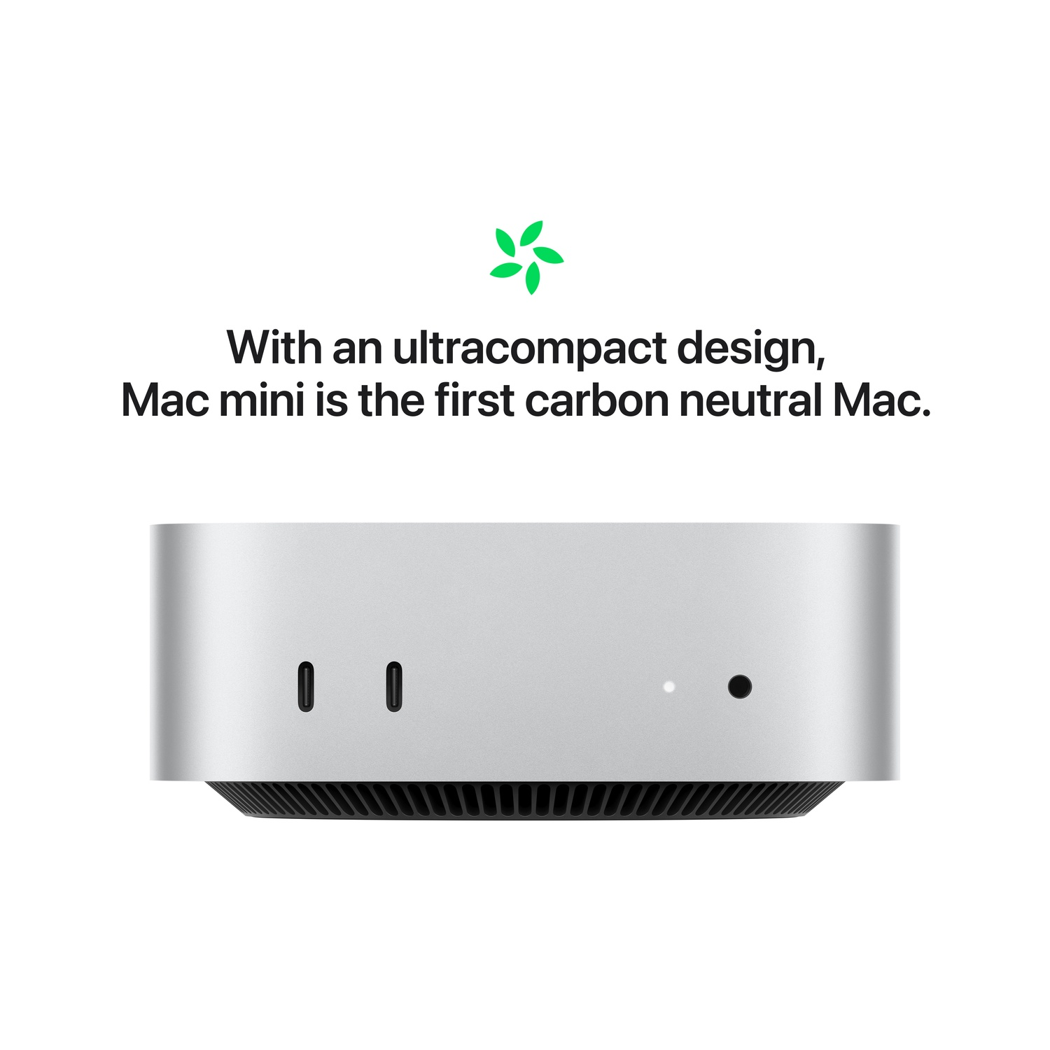 Silver Mac mini with text: With an ultracompact design, Mac mini is the first carbon neutral Mac.
