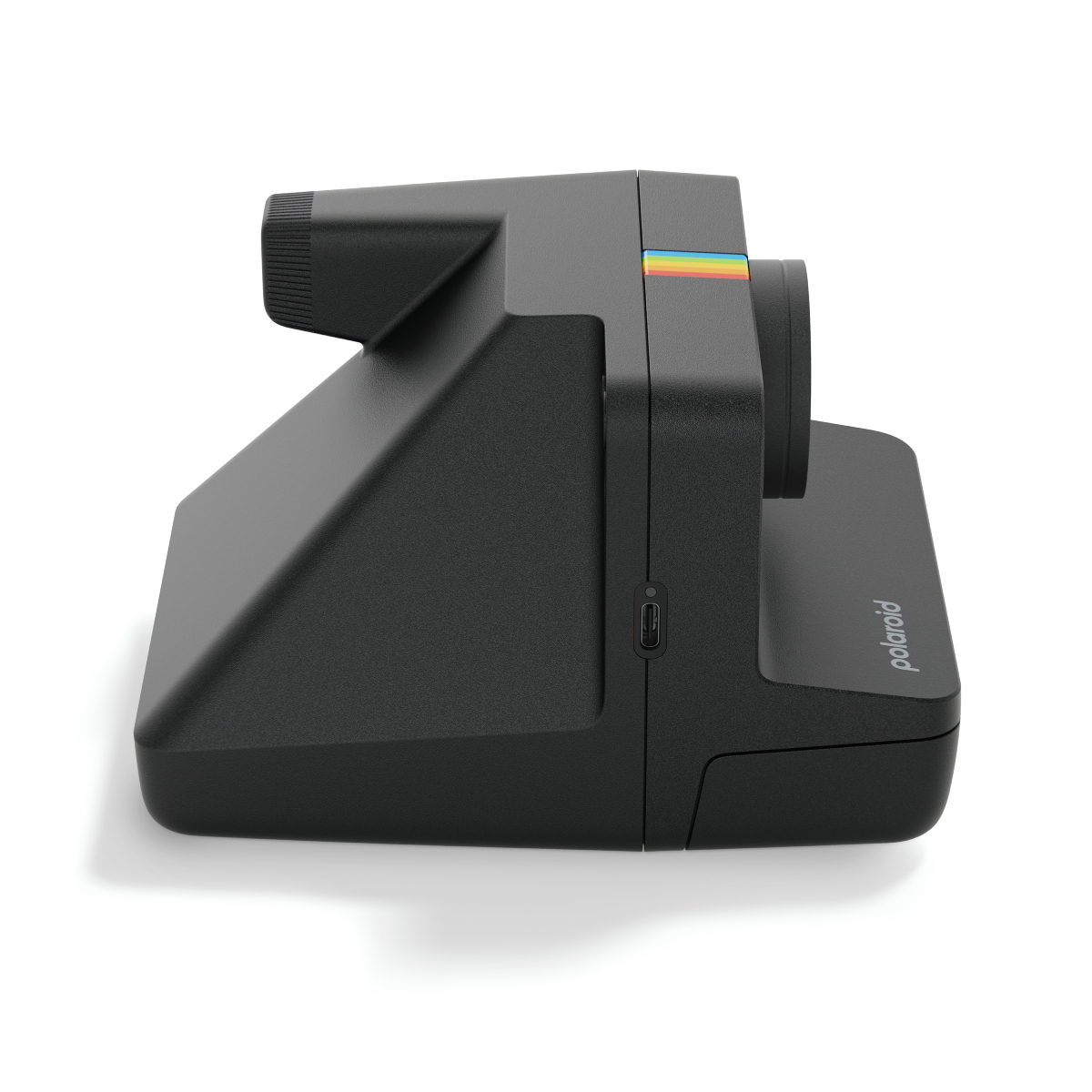Schwarze Polaroid Kamera mit Regenbogenstreifen Detail auf weißem Hintergrund.