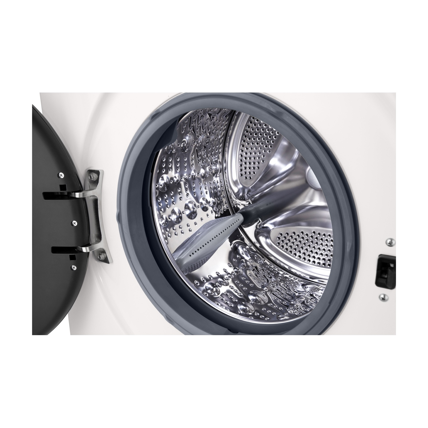 Interno della lavatrice, porta aperta. Cesto in acciaio inossidabile, guarnizione grigia e dettagli visibili.