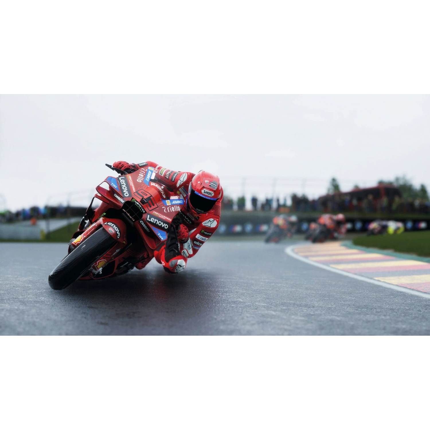 Motorcycle racer on track, red suit, blurred background.