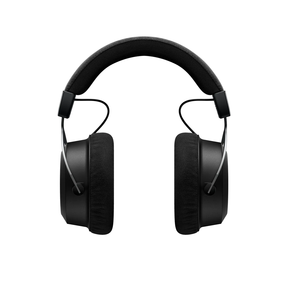 Auriculares negros sobre la oreja sobre fondo negro. Las almohadillas son grandes y acolchadas.
