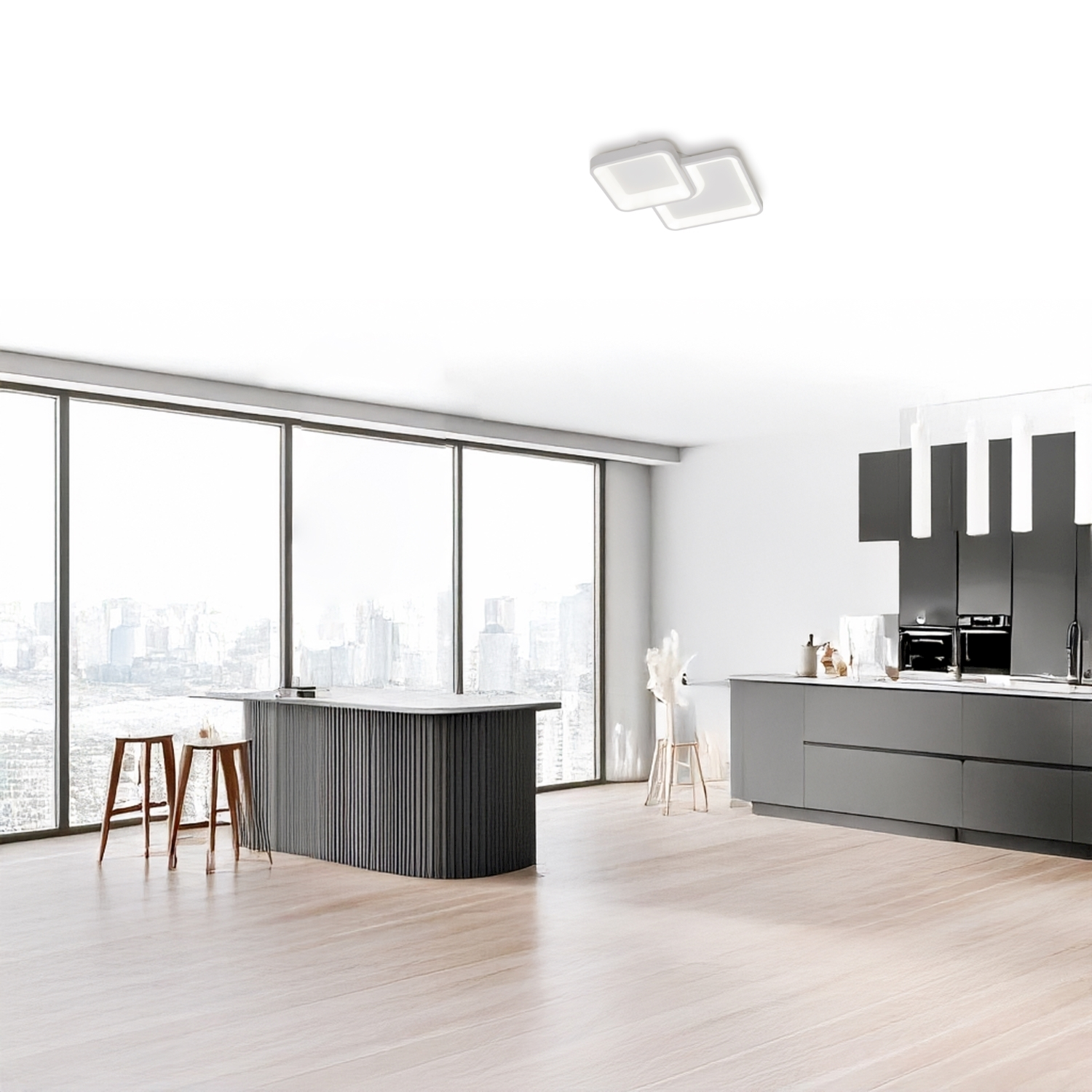 Cucina moderna con isola, sgabelli, ampie finestre e vista sulla città.