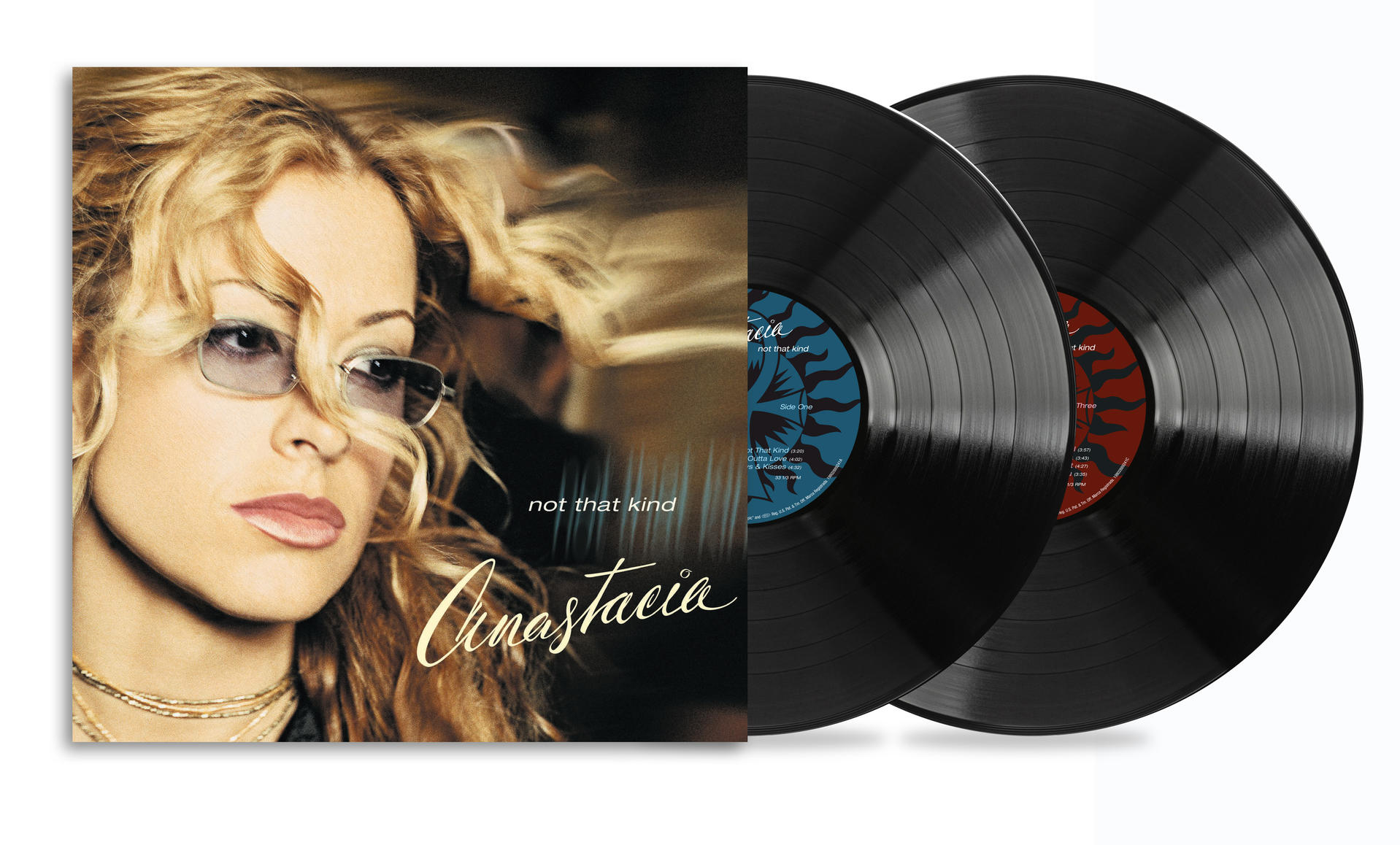 Anastacia-Albumcover und zwei schwarze Schallplatten auf weißem Hintergrund.