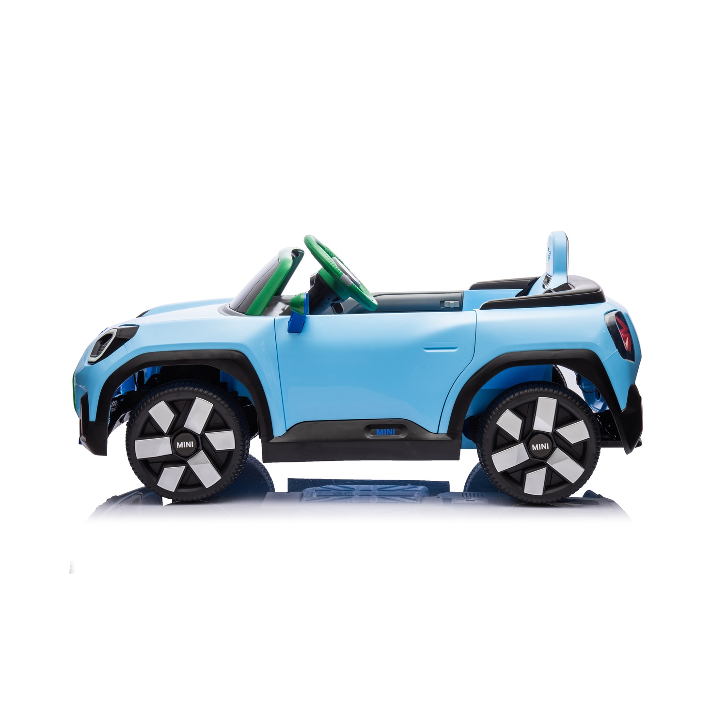 A light blue toy car, a Mini Cooper look-alike, on a white background.  Green steering wheel visible.