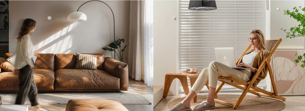 Kobieta chodzi w nowoczesnym salonie, druga pracuje na laptopie w słonecznym miejscu.