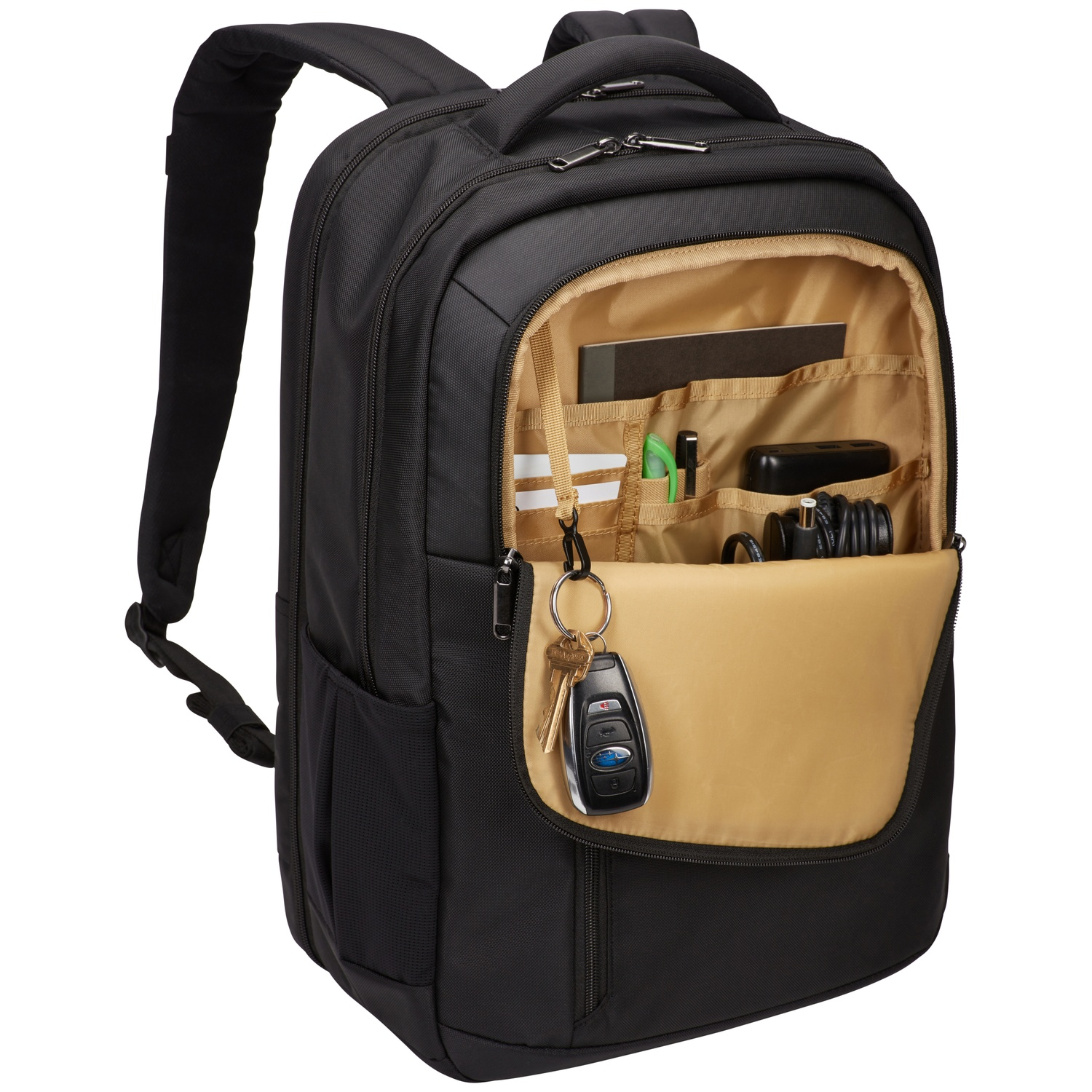 Sac à dos noir avec intérieur ouvert montrant le contenu.
