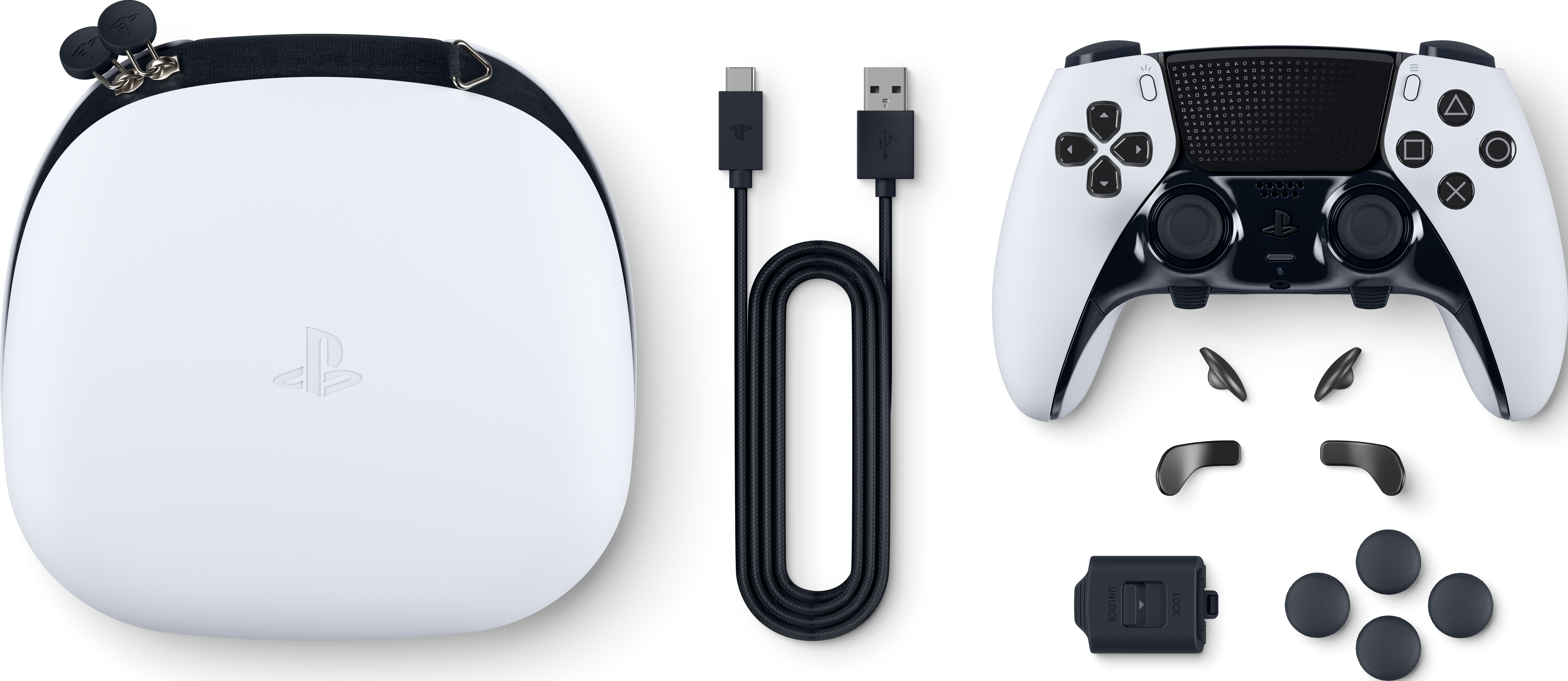 Weißer PlayStation Edge Controller, Hülle, Ladekabel und Zubehör auf weißem Hintergrund.