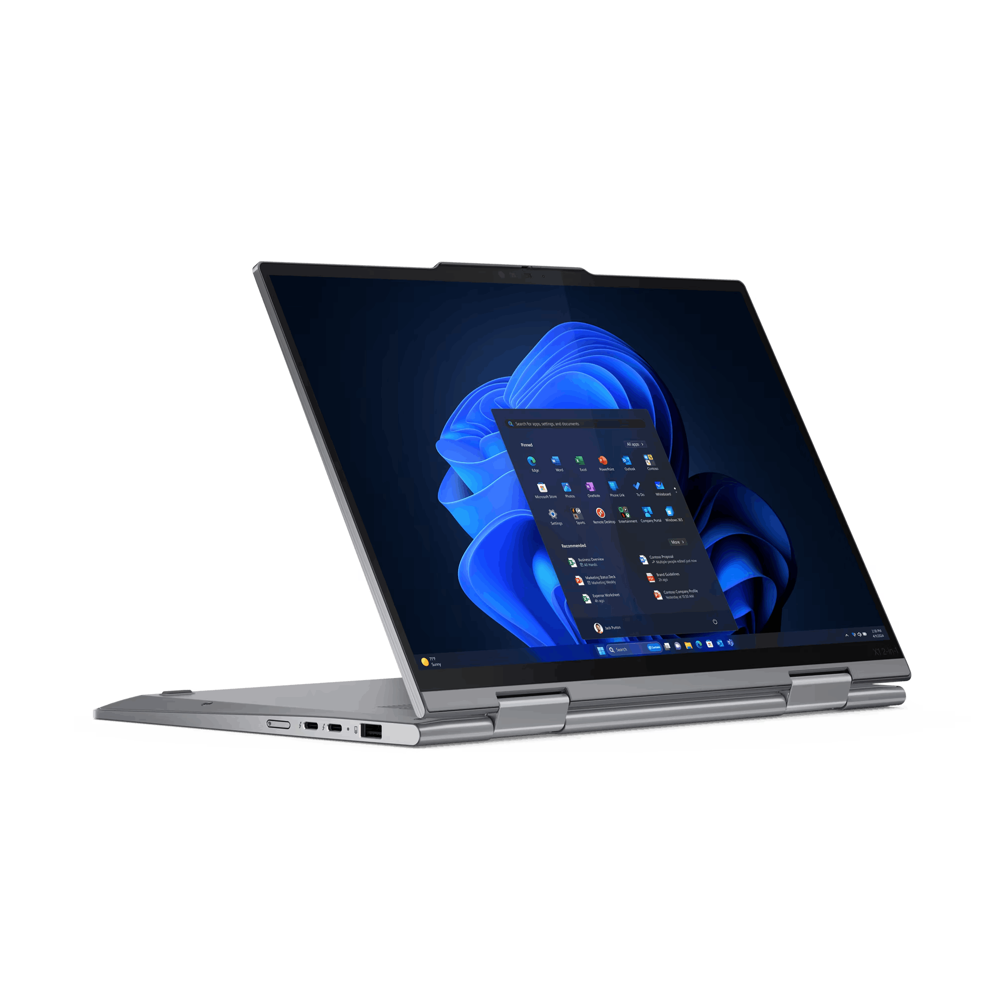 Un portátil plateado con la pantalla abierta, mostrando un menú de Windows.