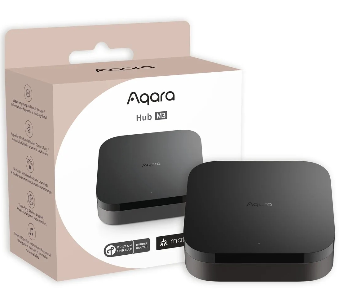 Pudełko Aqara Hub M3. Jest czarne i stoi na białej powierzchni. Pudełko ma tekst i ikony.