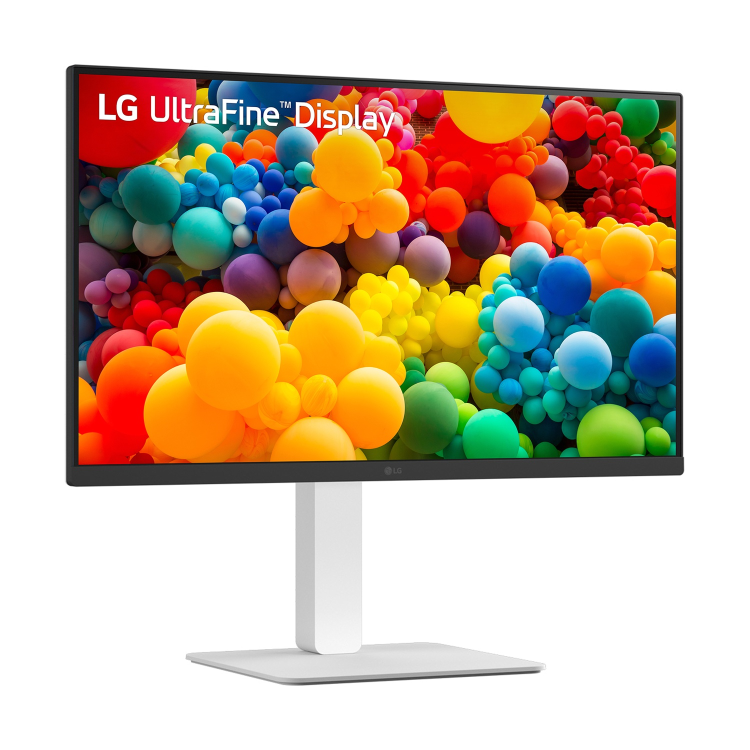 Un monitor LG UltraFine che mostra palloncini colorati su un supporto e una base bianchi.