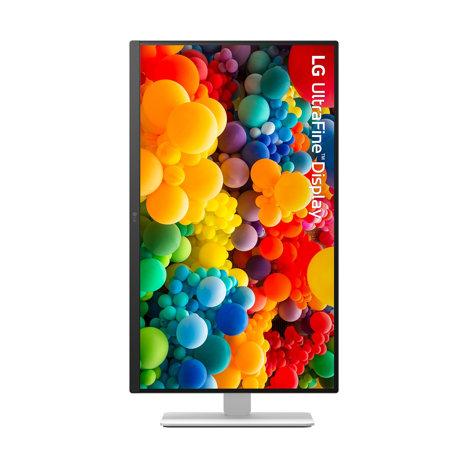 Monitor LG UltraFine Display. Sfere colorate su sfondo bianco.
