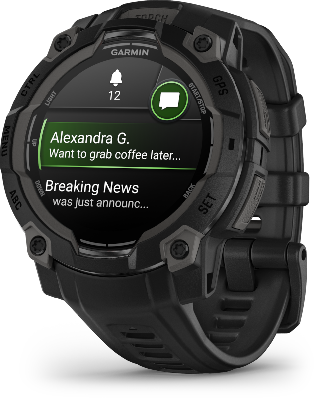 Fekete Garmin óra. Egy üzenetet jelenít meg: „Alexandra G. Később mehetnénk kávézni...“.