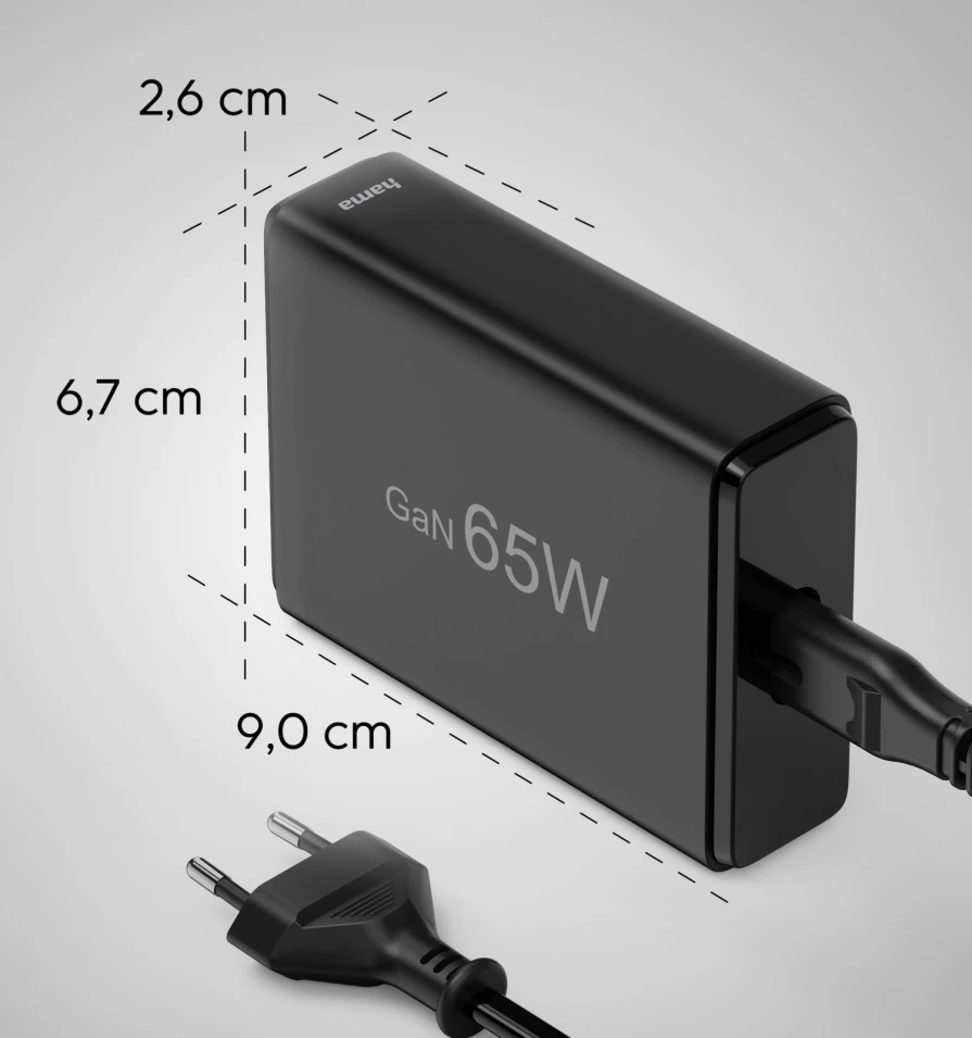 Czarny zasilacz z wymiarami. Jest to czarny prostokąt z wtyczką.