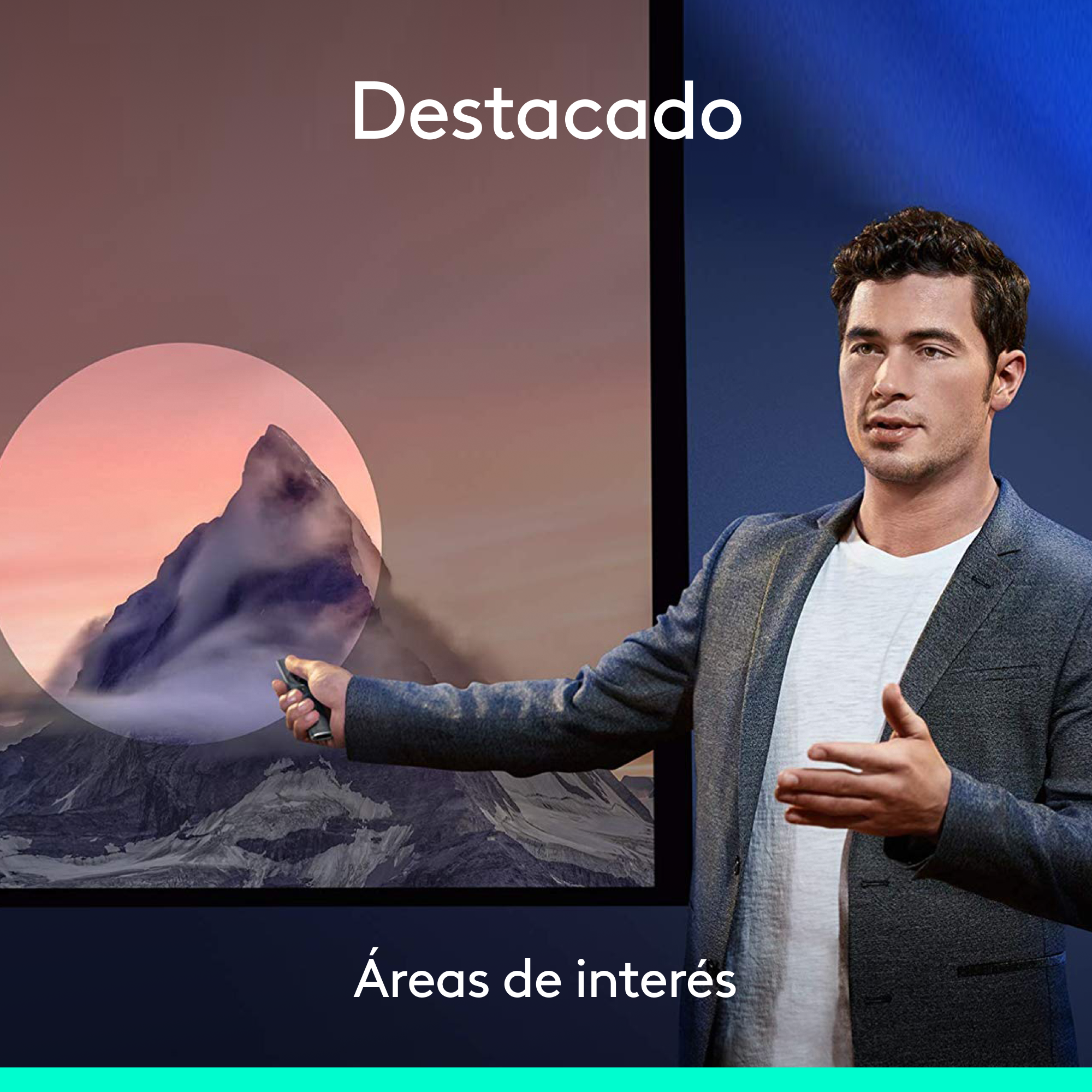 Hombre con chaqueta gris señalando una imagen de montaña en una pantalla. Texto en español.