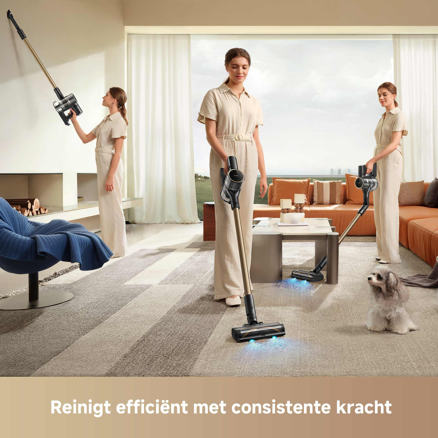 Three women vacuum a living room with cordless vacuums. A small dog sits on the carpet. The room has large windows.