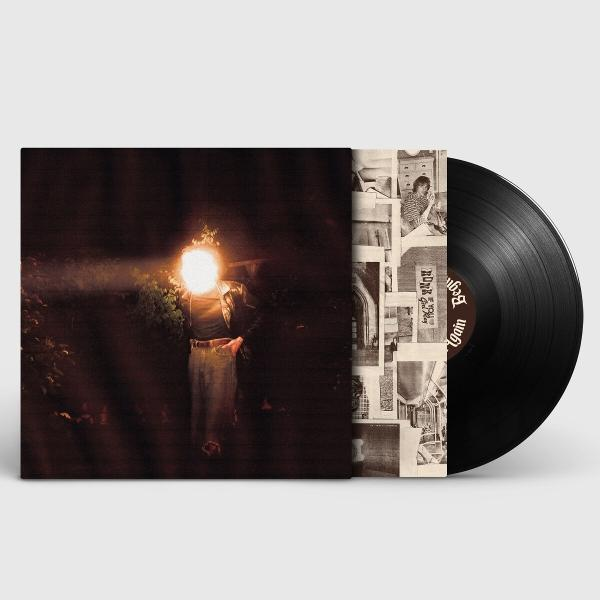 Albumcover: Eine Person mit Licht auf dem Kopf, die im Dunkeln geht. Eine Schallplatte rechts.