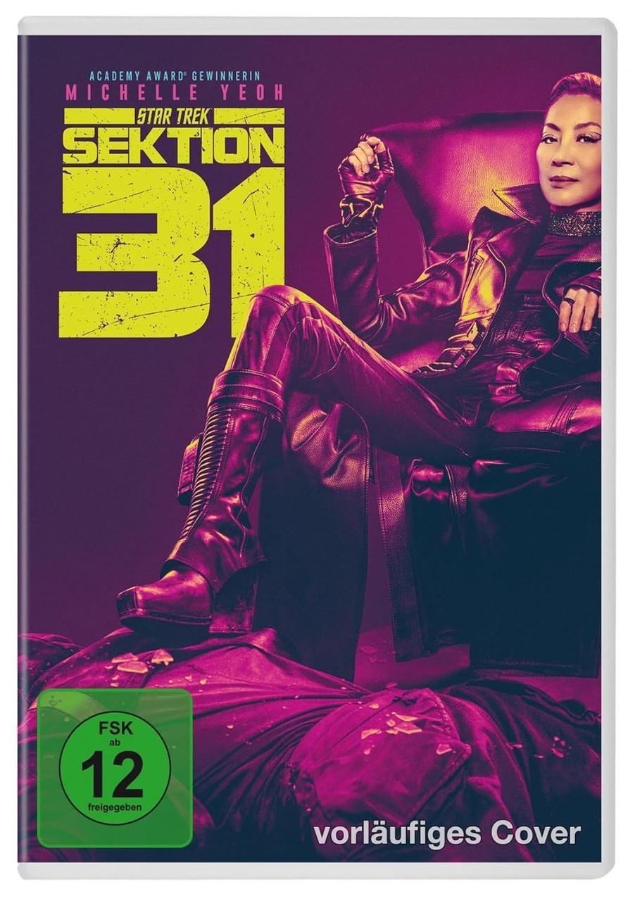 DVD-Cover: Michelle Yeoh in dunklem Outfit. Text und ein grüner Aufkleber sind sichtbar.