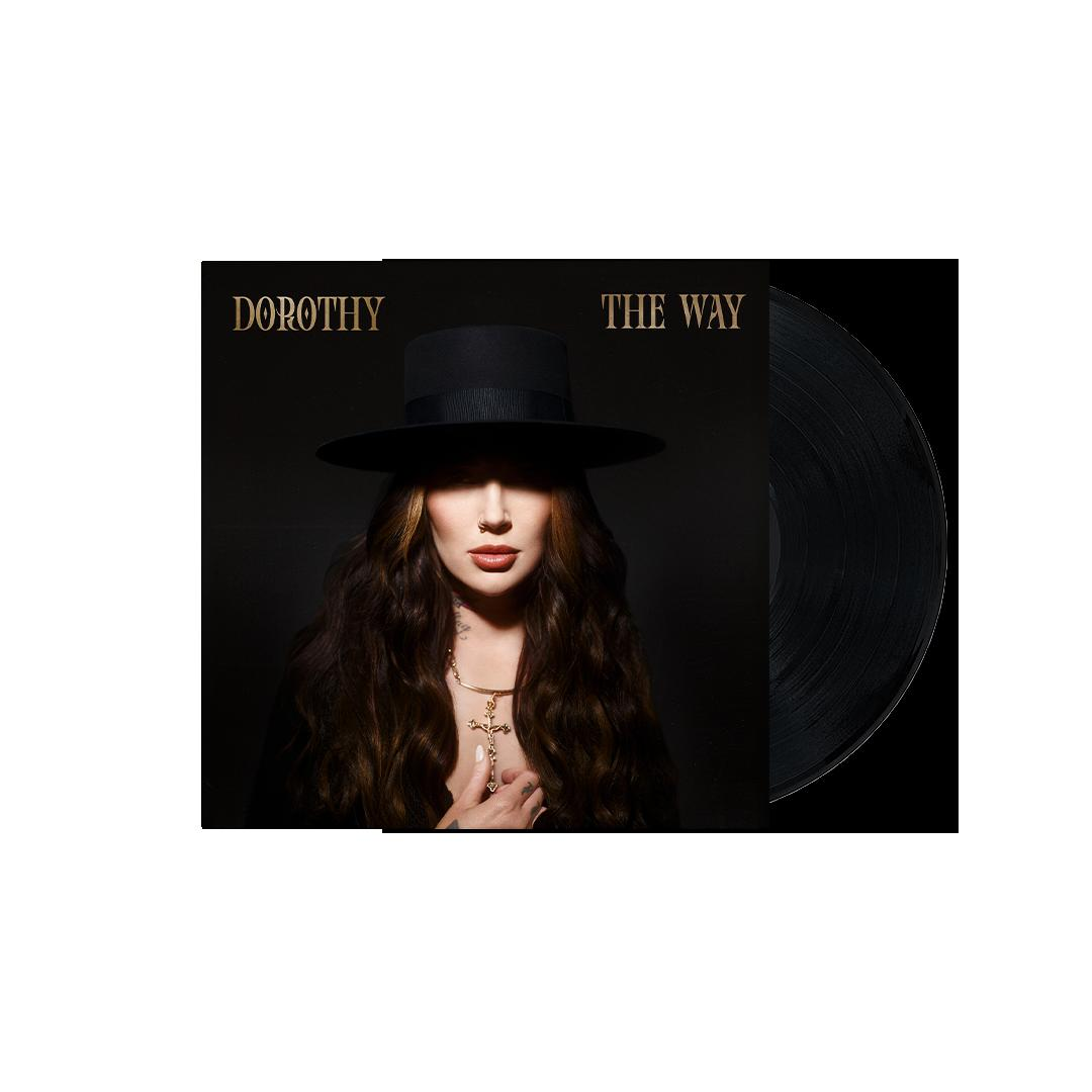 Albumcover für Dorothy's 'The Way'. Eine Frau mit Hut steht im Zentrum, mit einer Vinylplatte.