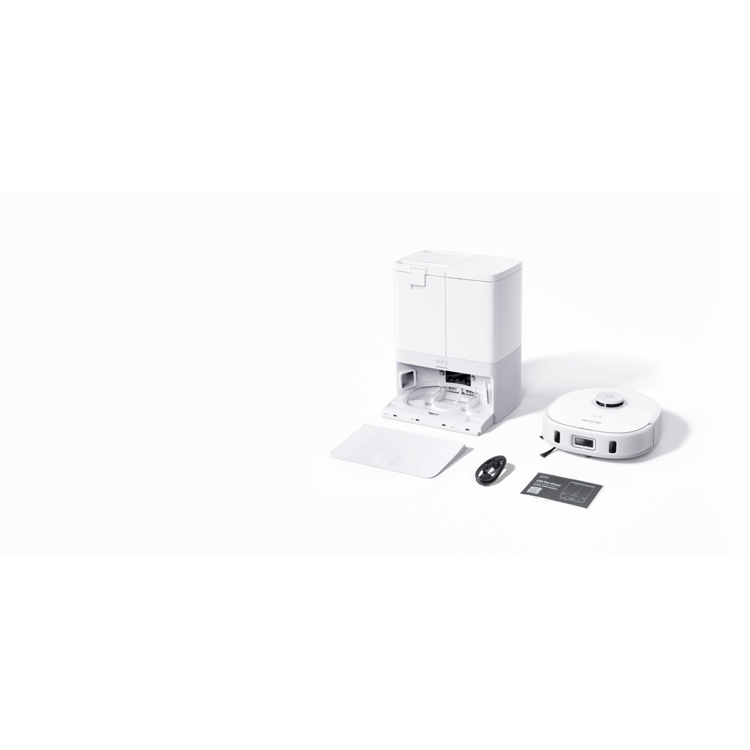 White robot vacuum cleaner with charging station and accessories.  Isolated on white.