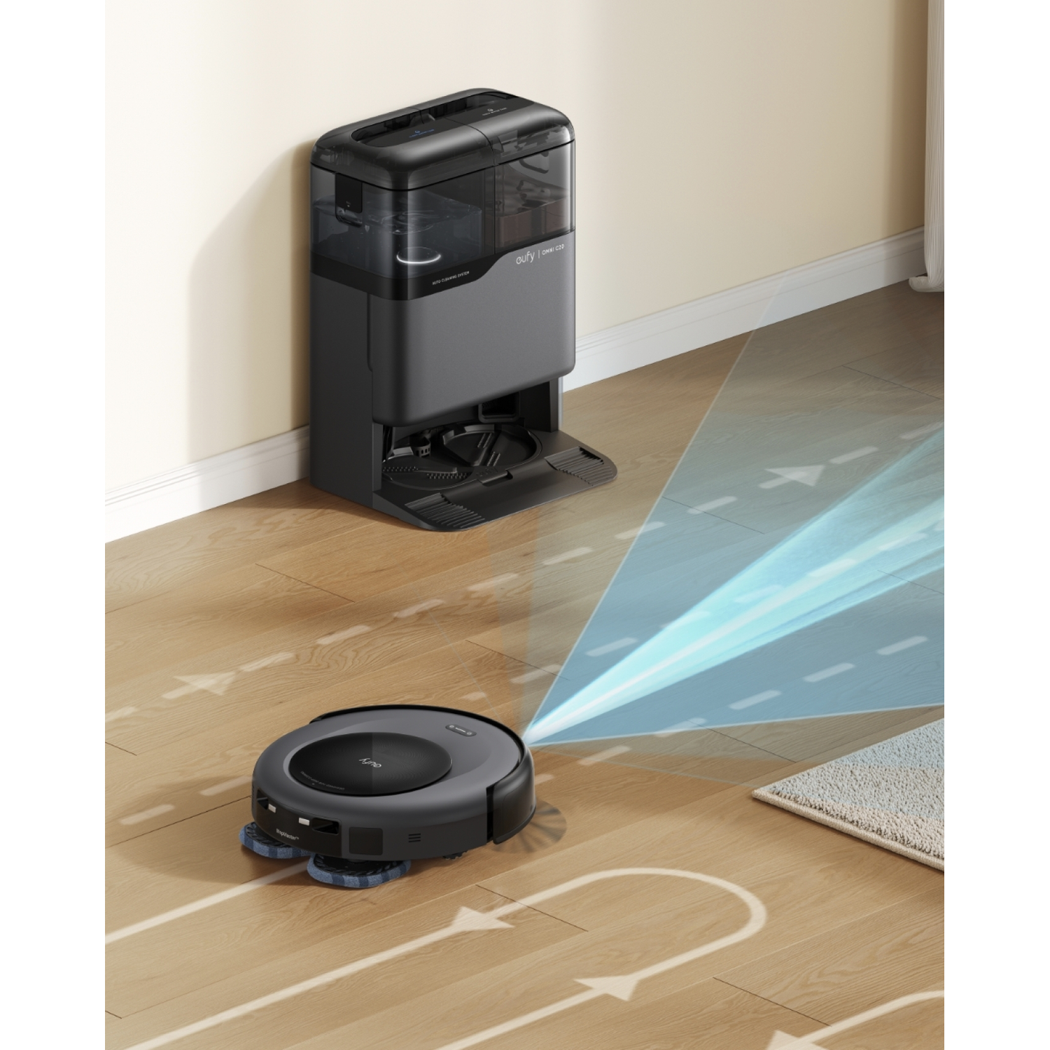 Un aspirateur robot et sa station de charge sur un plancher en bois.