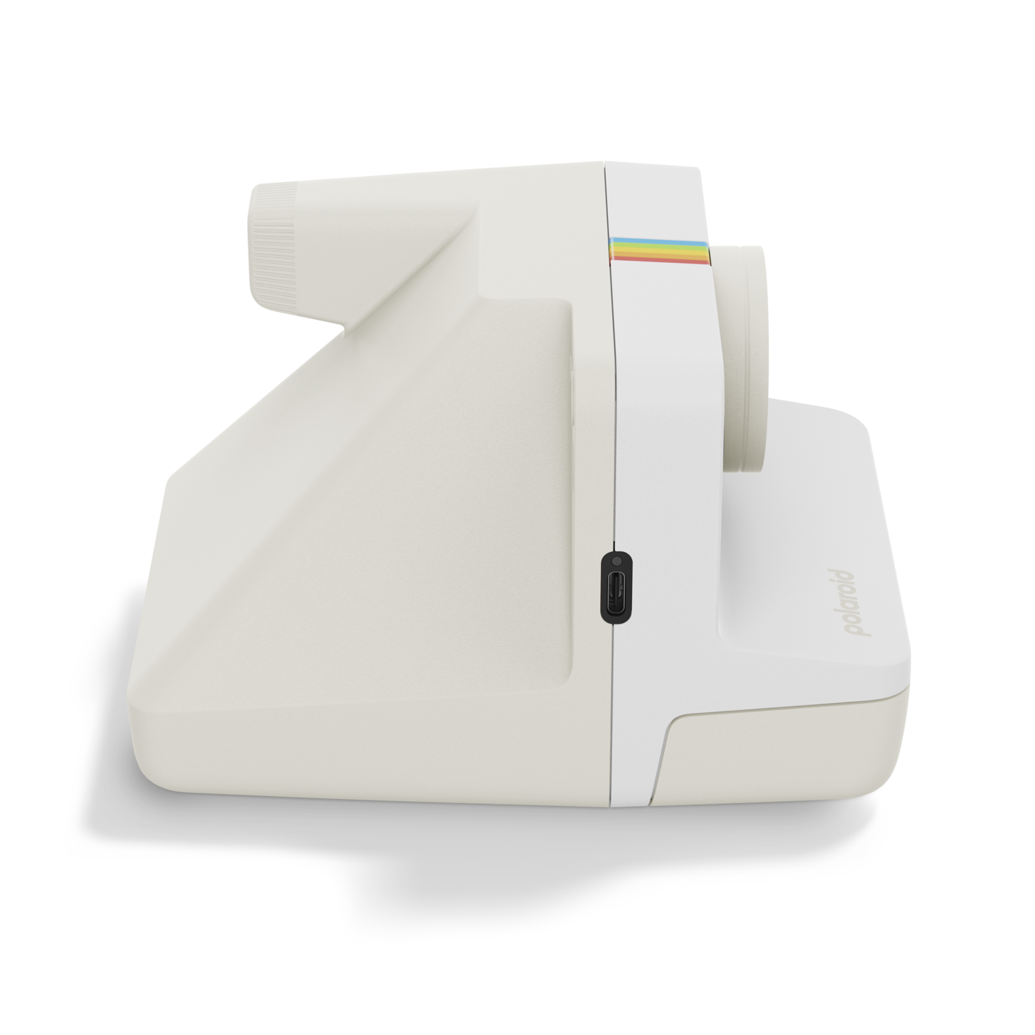 Polaroid camera, white body, rainbow stripe. Viewed from the side, isolated on black background.