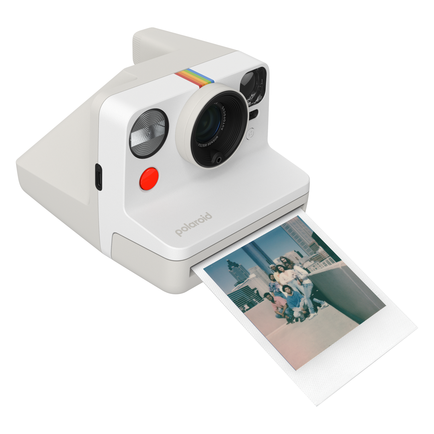 A white Polaroid camera with a picture of a group of people on a roof.