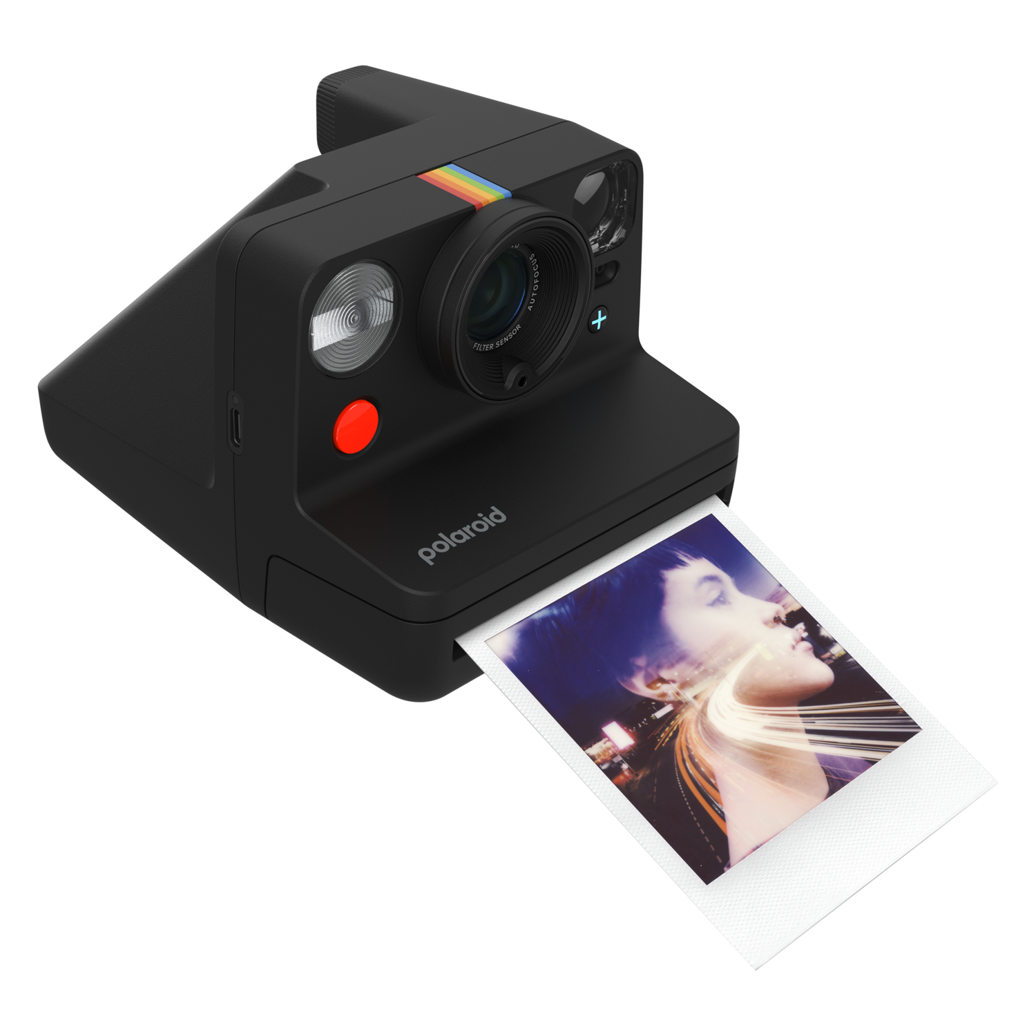 Black Polaroid camera printing a photo. The camera has a red button.