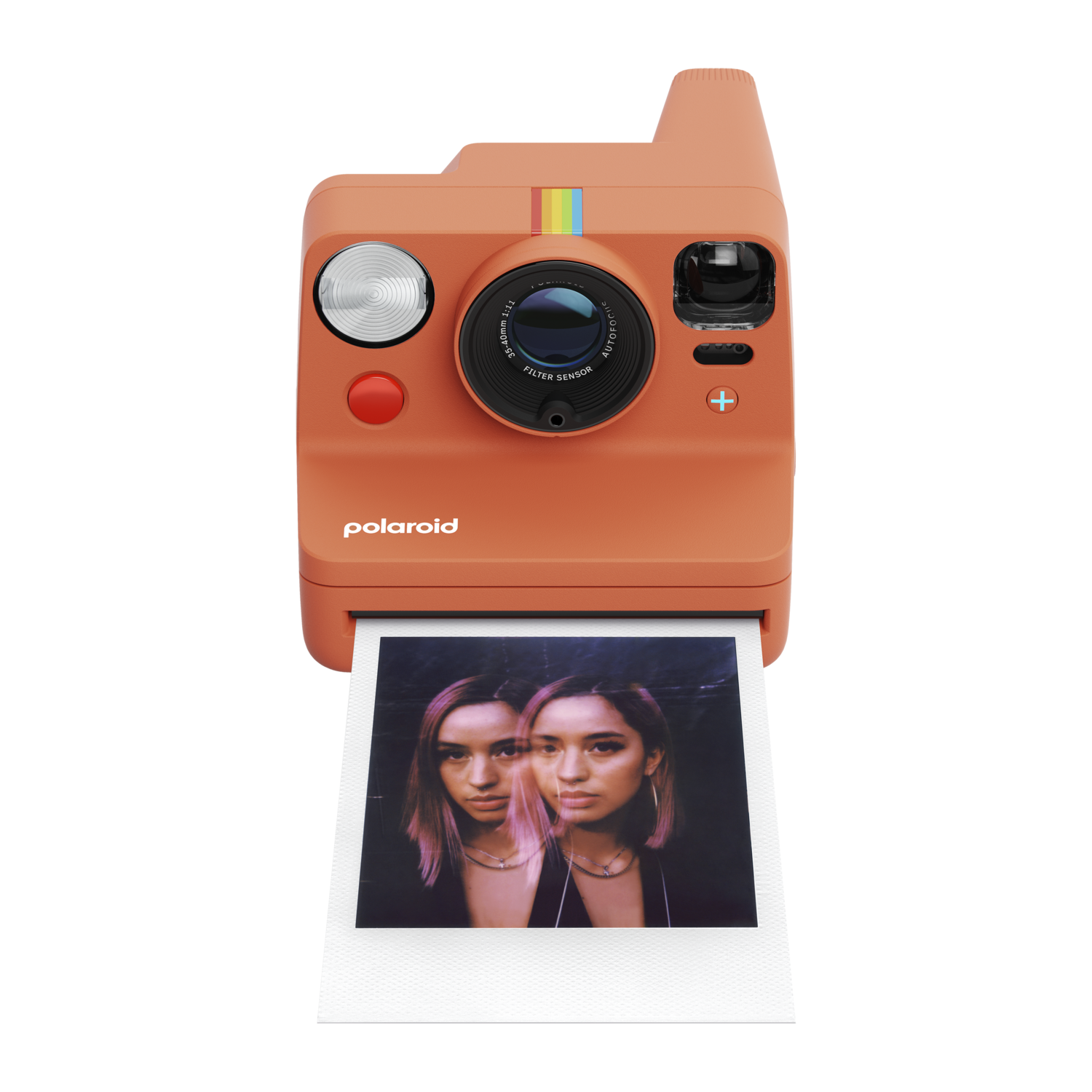 Un appareil photo Polaroid orange avec une photo imprimée d'une femme à deux visages.