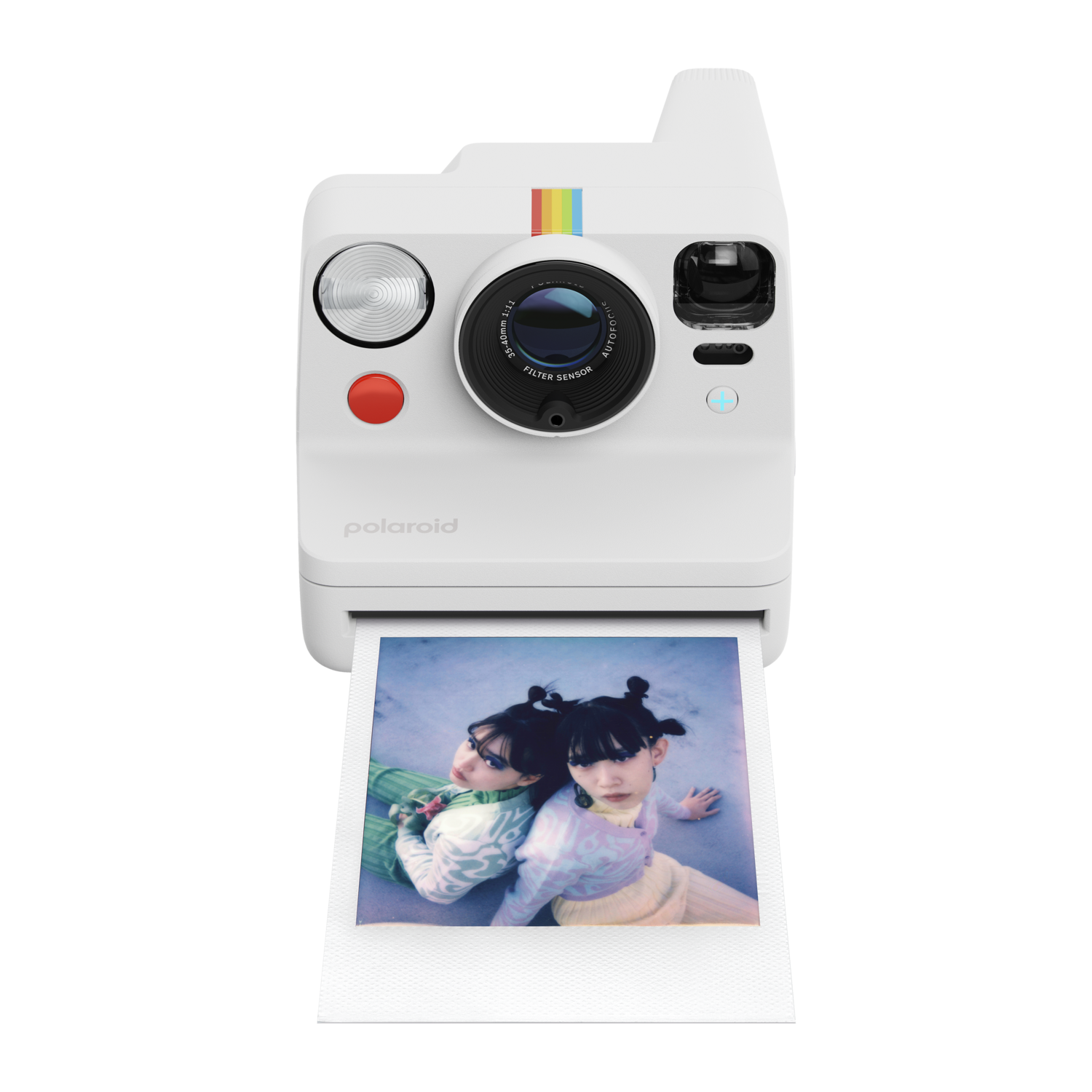 White Polaroid camera with rainbow stripe, printing a photo of two women.