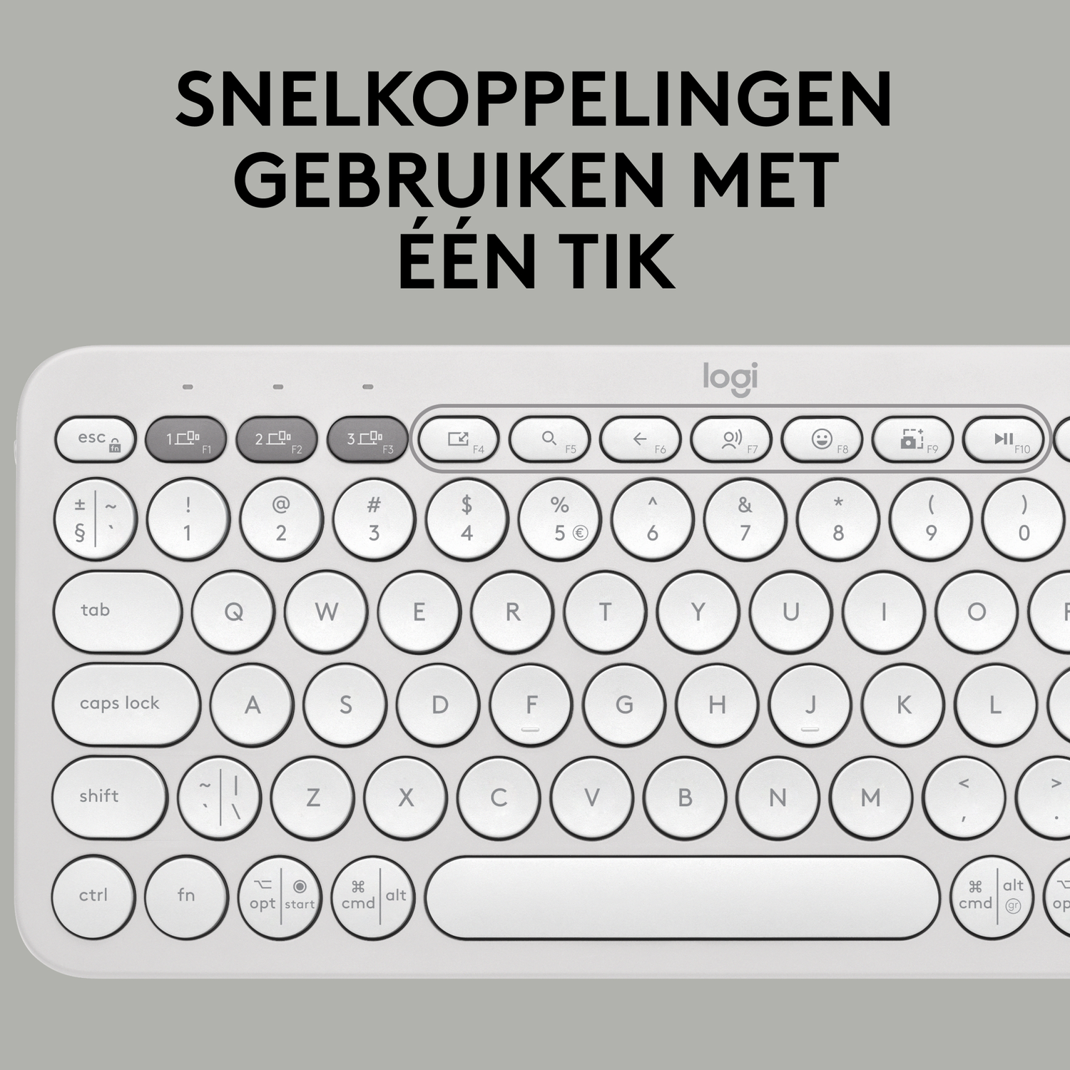 A white keyboard with many keys. The text on the top says 'SNELKOPPELINGEN GEBRUIKEN MET ÉÉN TIK'.