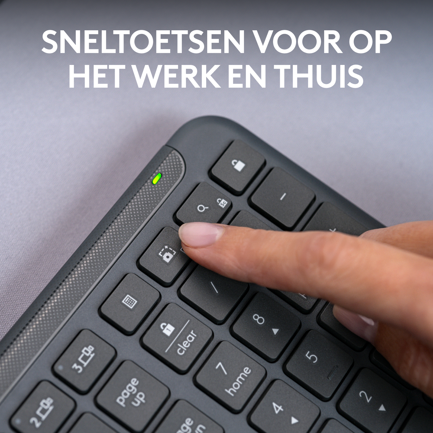 Person's finger pressing a key on a dark keyboard. Text: "Shortcuts for work and home."