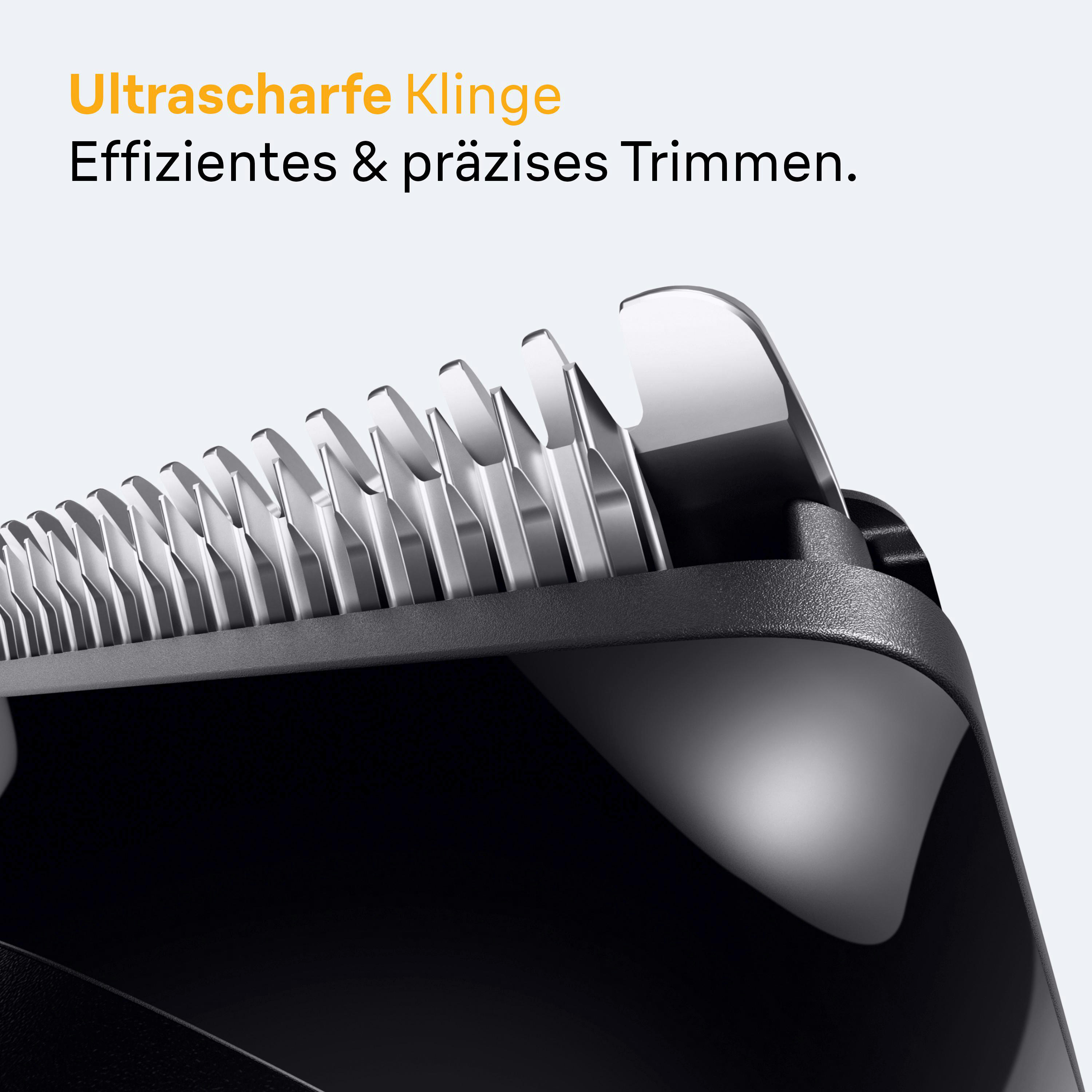 Nahaufnahme einer Trimmerklinge mit scharfen Kanten, schwarz und silberfarben.