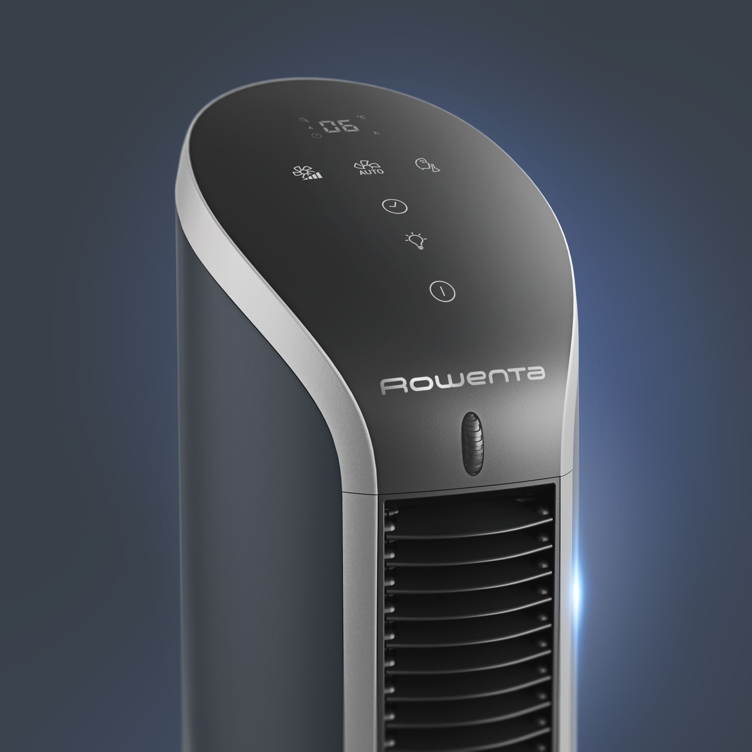 Gros plan d'un ventilateur Rowenta noir et argenté. Le dessus a des boutons et un écran.