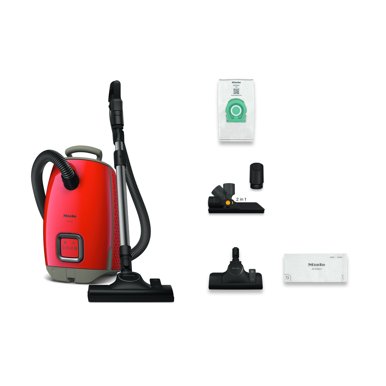 Aspirapolvere rosso con accessori. Il set include un sacchetto, una spazzola e altri accessori.