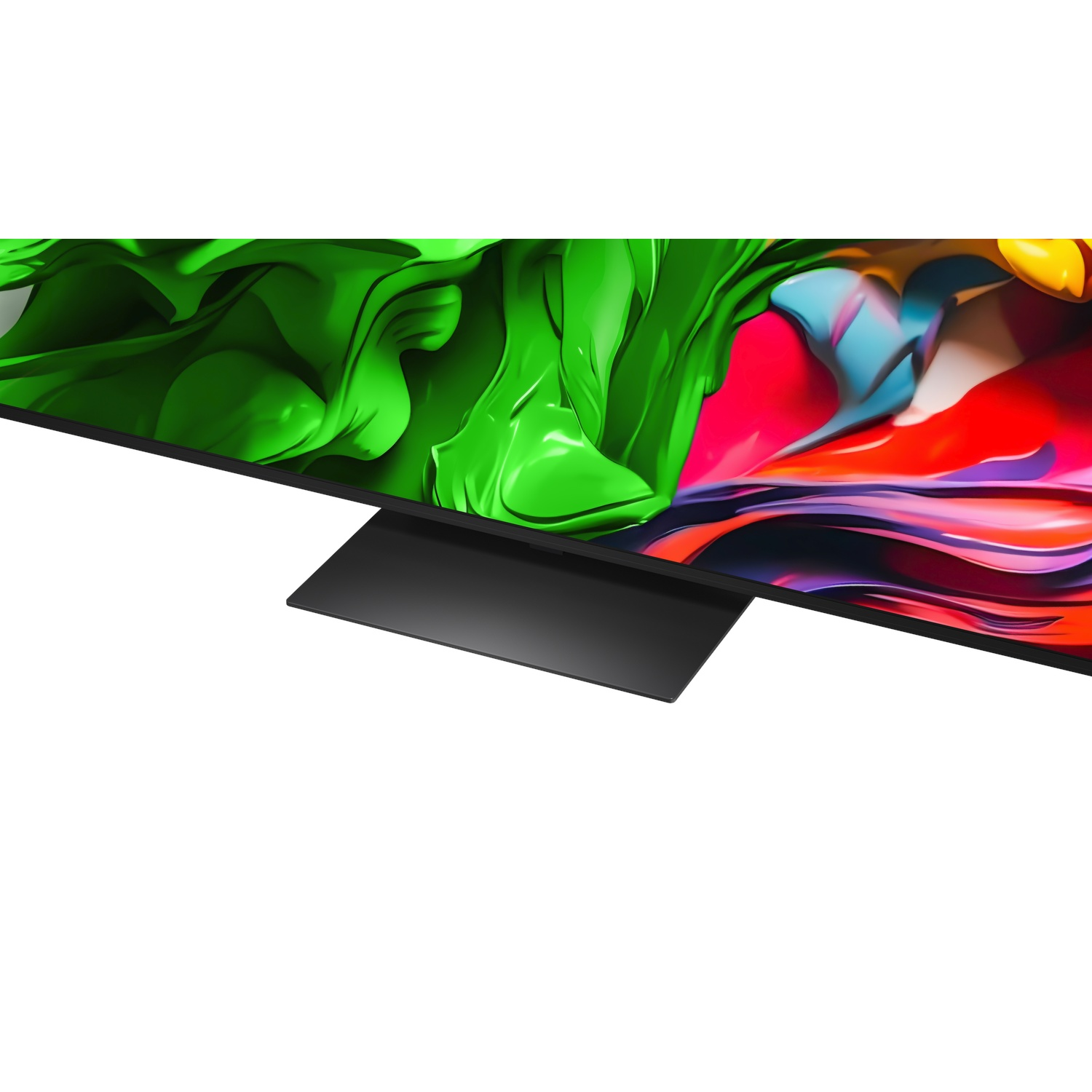 A TV screen displays colorful abstract art, including green, red, blue, and yellow. A black stand supports the screen on a white surface.