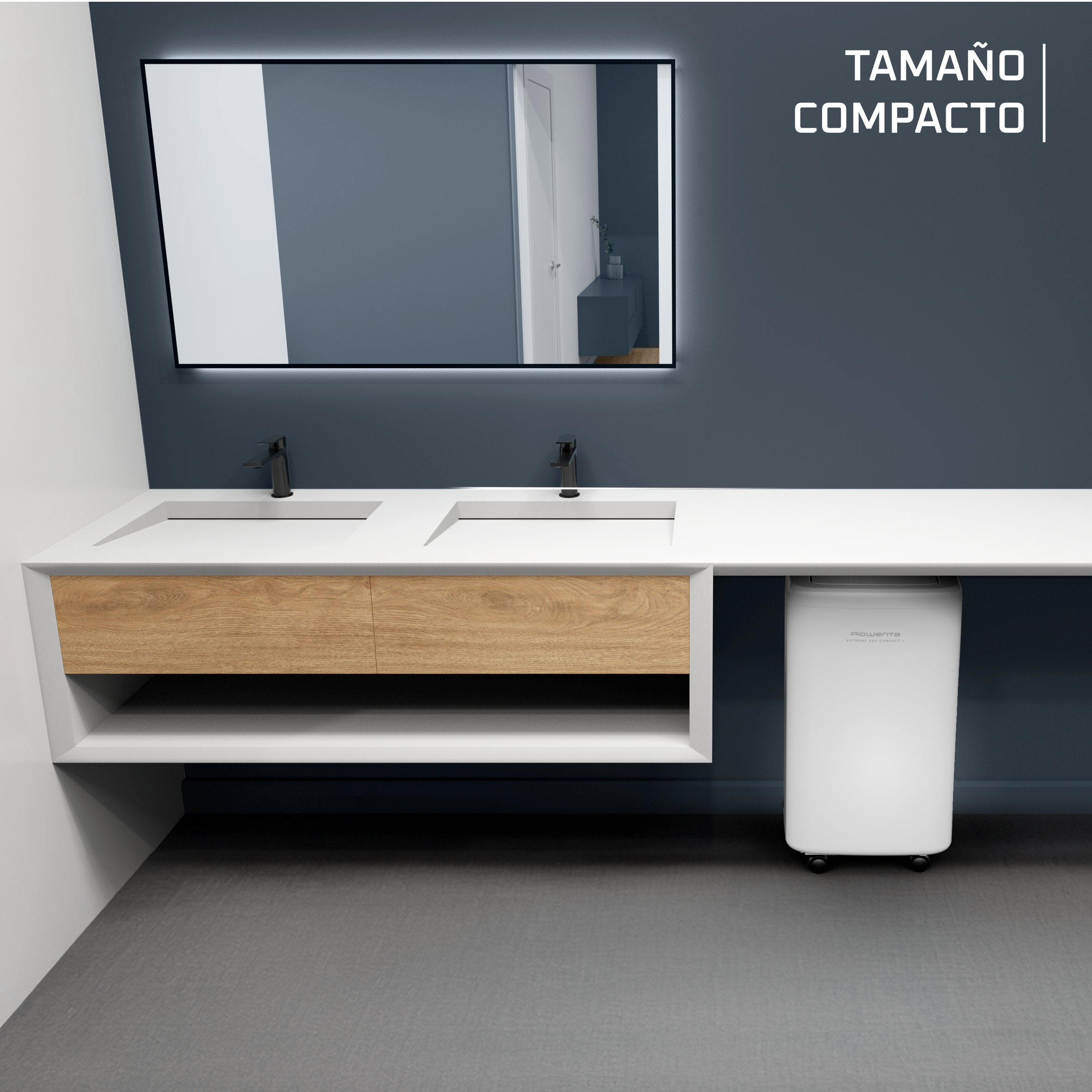 Baño con lavabo blanco, grifos negros, espejo y deshumidificador blanco.