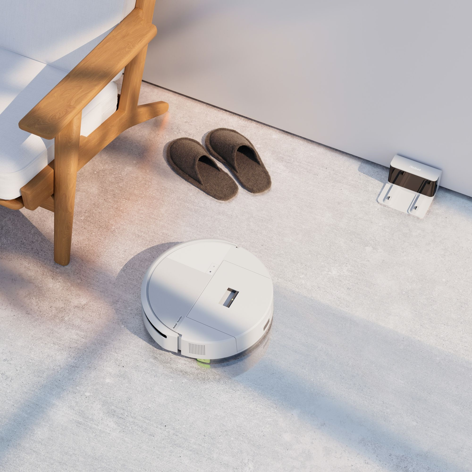 Odkurzacz automatyczny na podłodze. Krzesło i kapcie w tle.