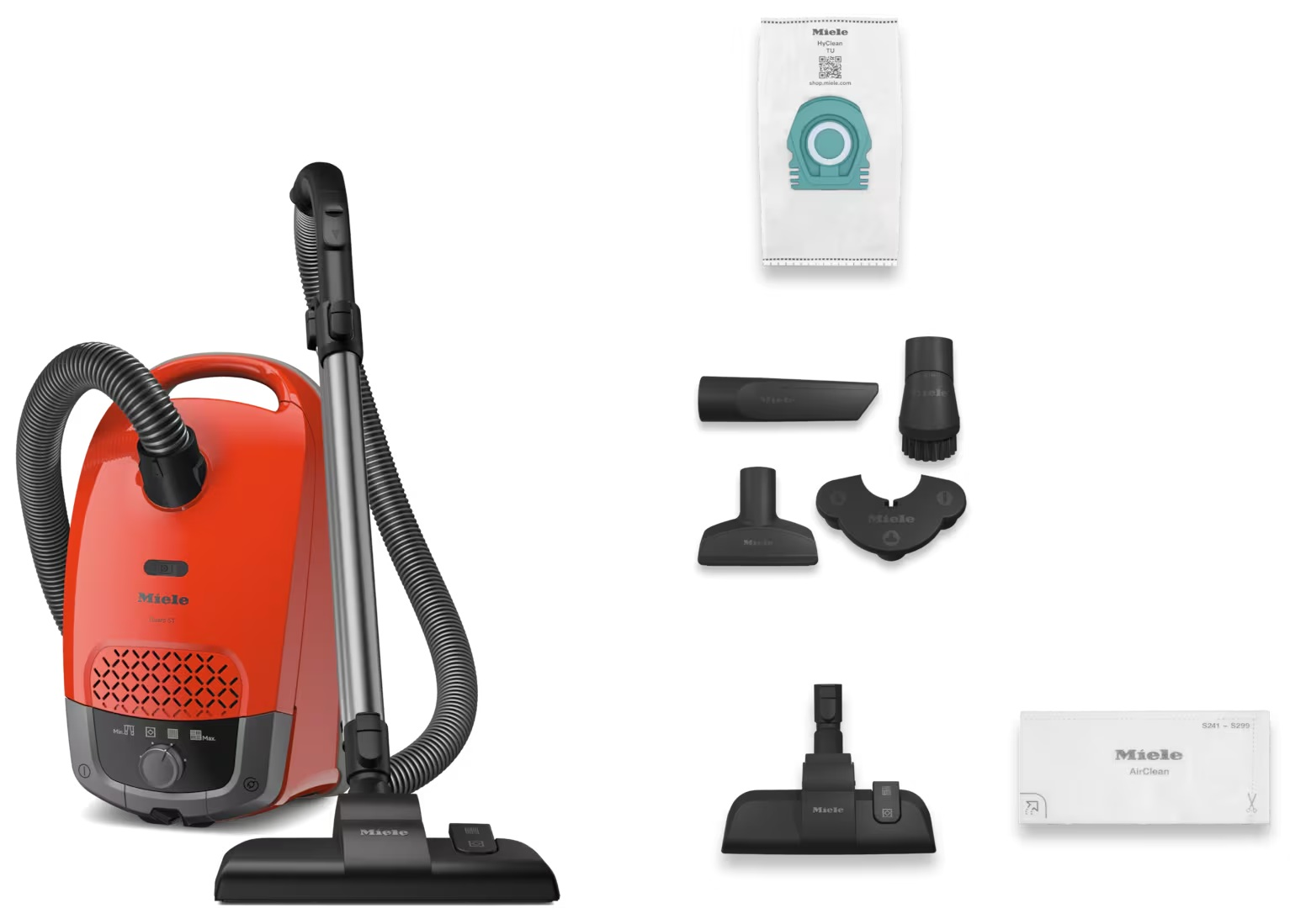 Odkurzacz z akcesoriami i workiem. Białe tło.