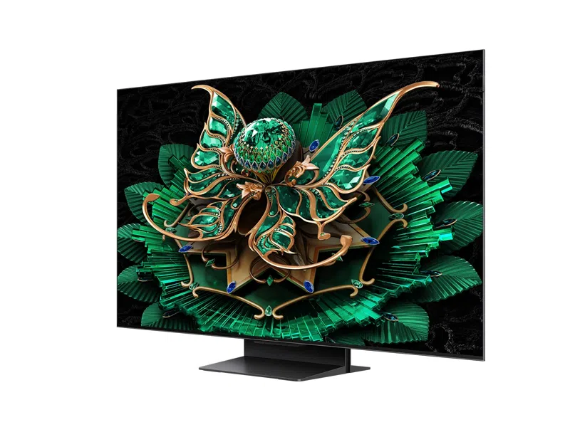 Großer Fernseher, Seitenansicht, zeigt Bildschirm mit grünen und goldenen Kunstwerken.