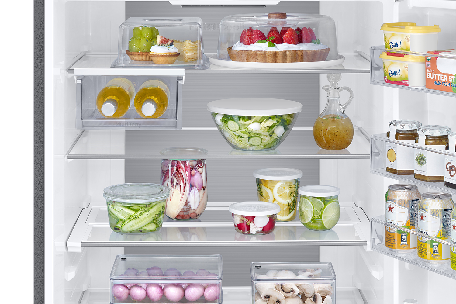 Refrigerator interior with food items on shelves.